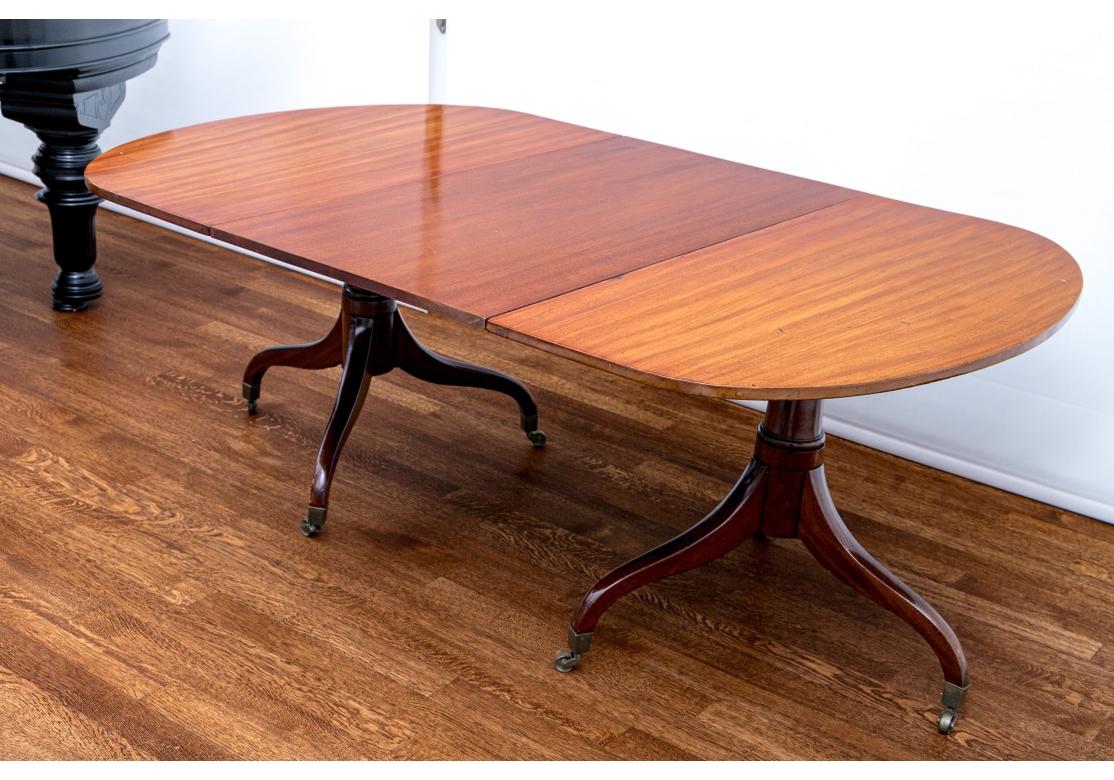 XIXe siècle Table de salle à manger ovale à double piédestal en acajou de style Regency ancien en vente