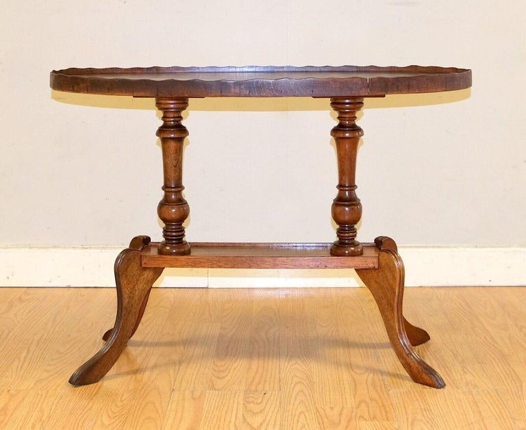 Antique Regency Style Oval Yew Wood Pie Crust Edge Coffee Table on
