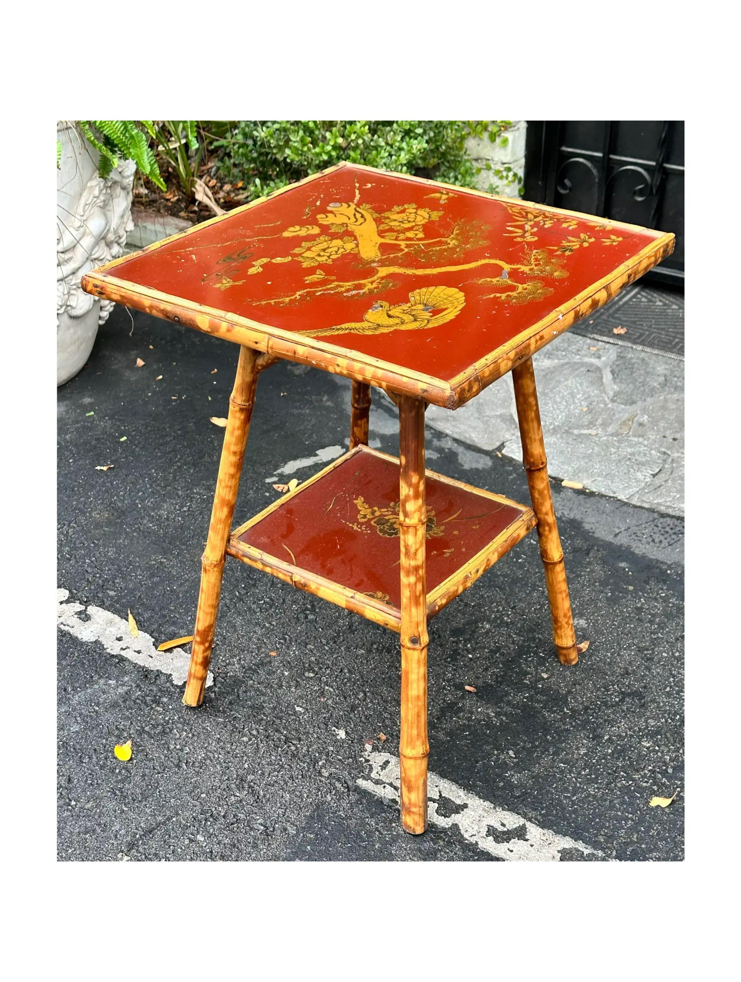 Antique Regency Style Red chinoiserie bamboo table. It features beautifully hand painted decoration on a cinnabar red ground.

Additional information: 
Materials: Bamboo
Color: Red
Period: 19th century
Styles: chinoiserie, Regency
Table