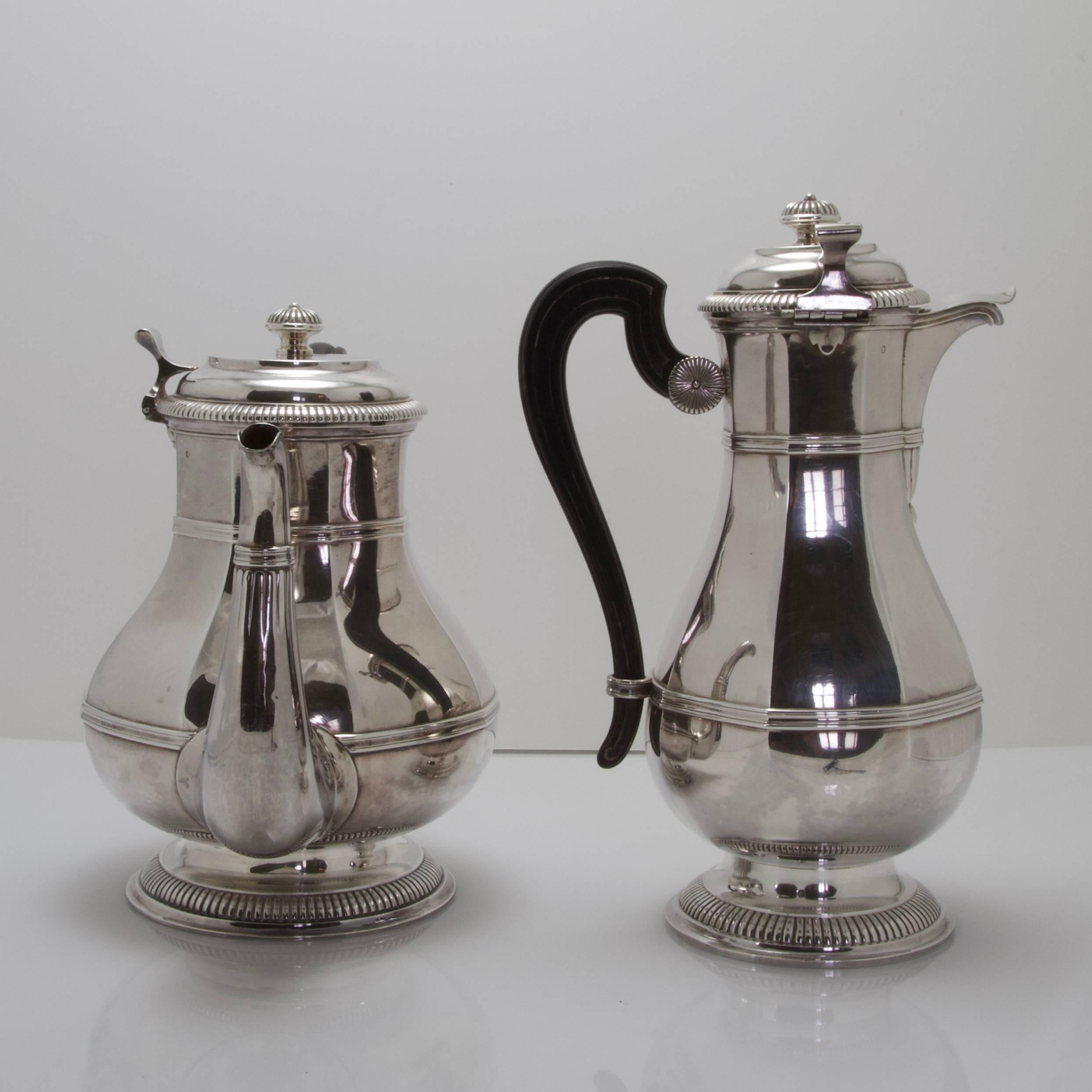 Antique tea and coffee set. Of large size, baluster-shaped on small piedestal, straight body 