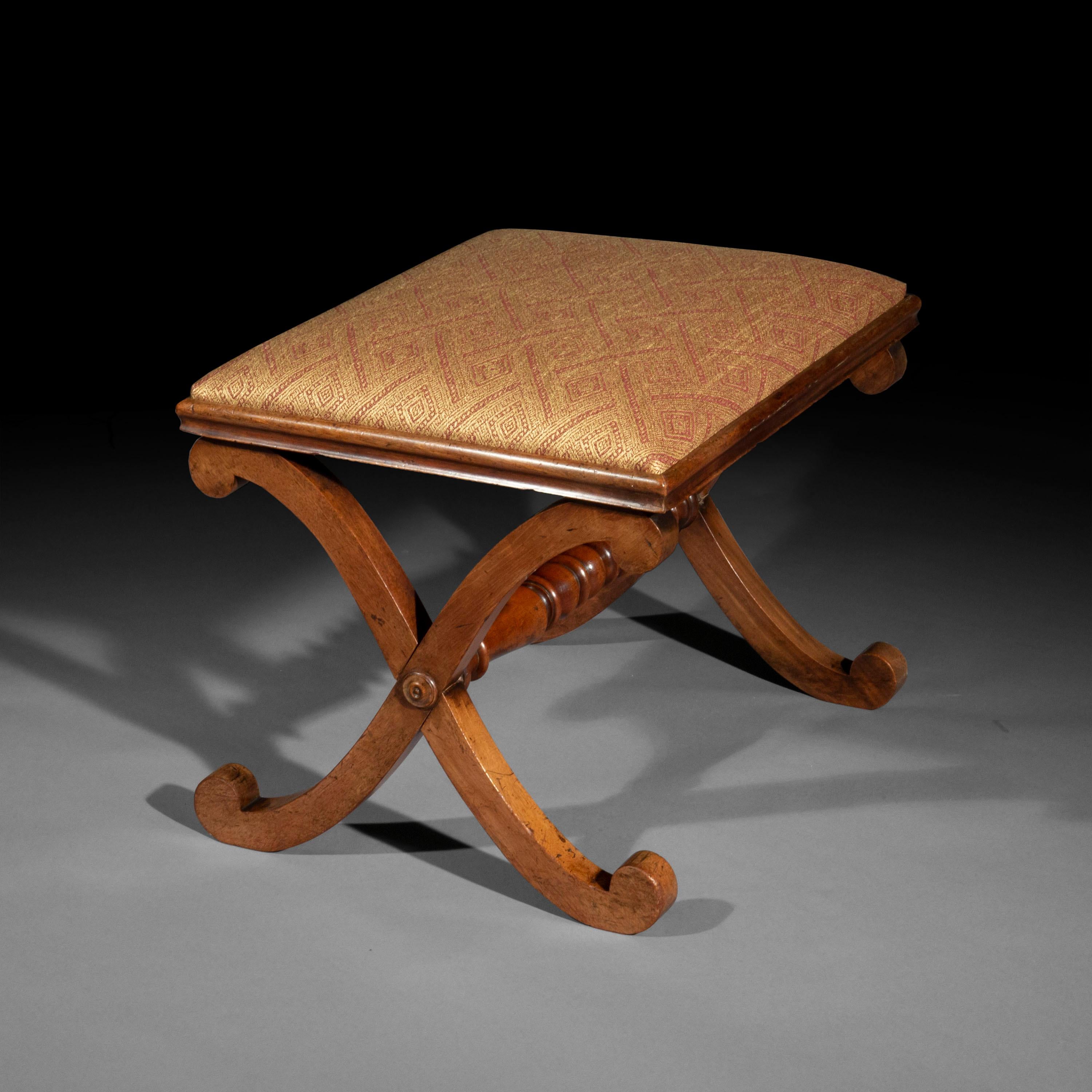 A Regency period X-frame stool after a design by Thomas Hope.
English, circa 1820–30.

Why we like it
Its unusually clean form, evoking classical antiquity, is both timeless and highly decorative. An elegant accent piece for a Classic or eclectic