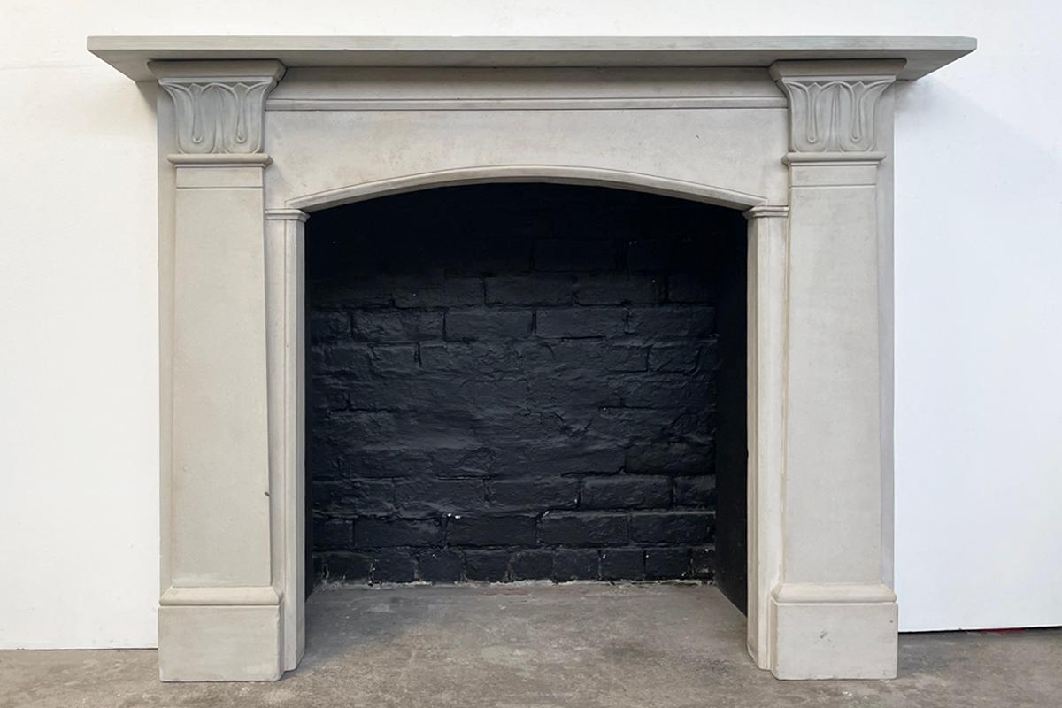 Antique early 19th century Regency grey York stone fire surround with finely anthemion carved capitals.

For detailed sizes please see the size diagram within the image gallery

Pictured with an antique fire grate.

 