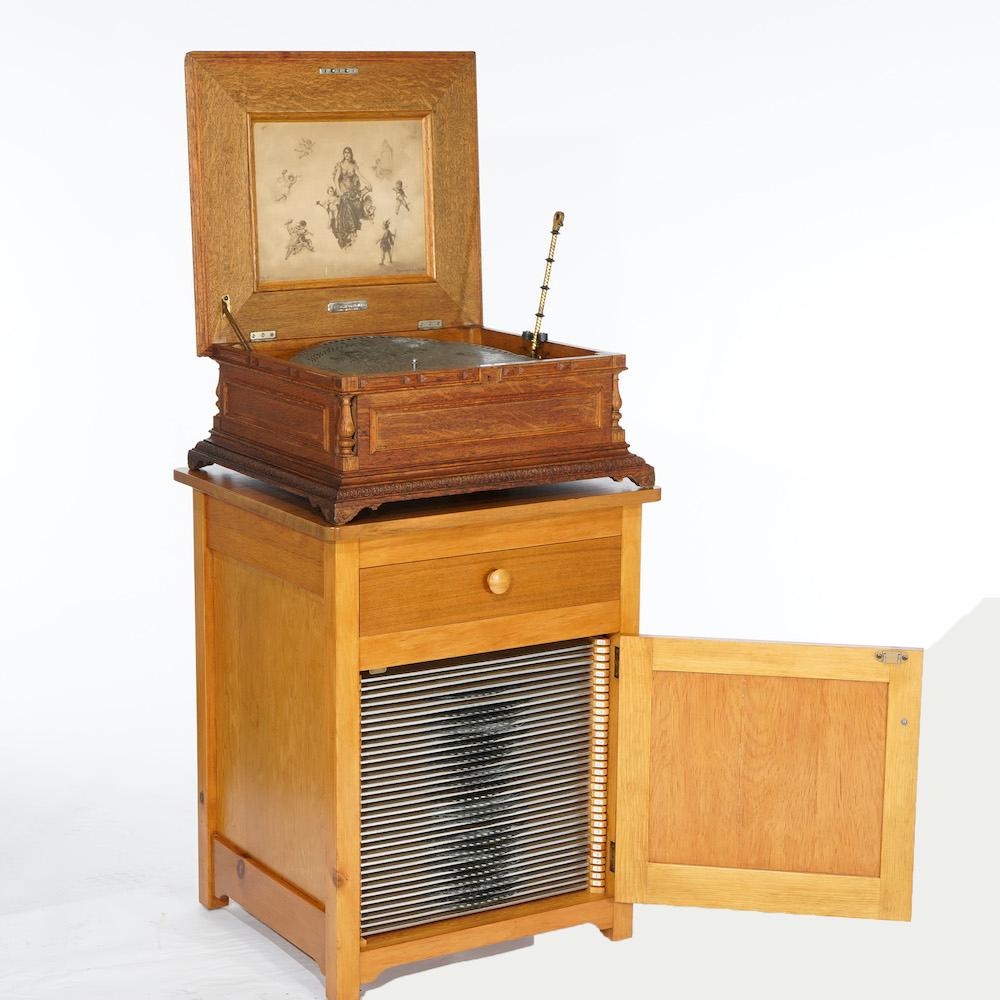 American Antique Regina Carved Oak Music Box with Custom Cabinet & Discs, c1890