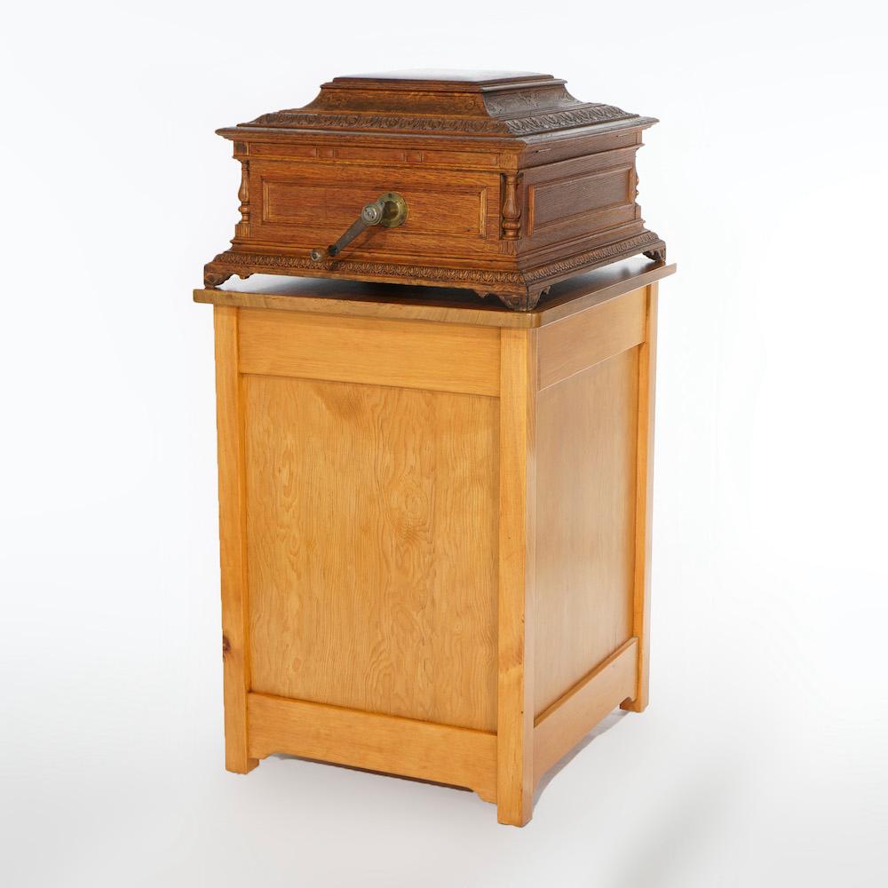 19th Century Antique Regina Carved Oak Music Box with Custom Cabinet & Discs, c1890