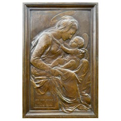 Plaque murale religieuse ancienne en bronze en forme de Sainte- Marie et d'enfant d'après Donatello