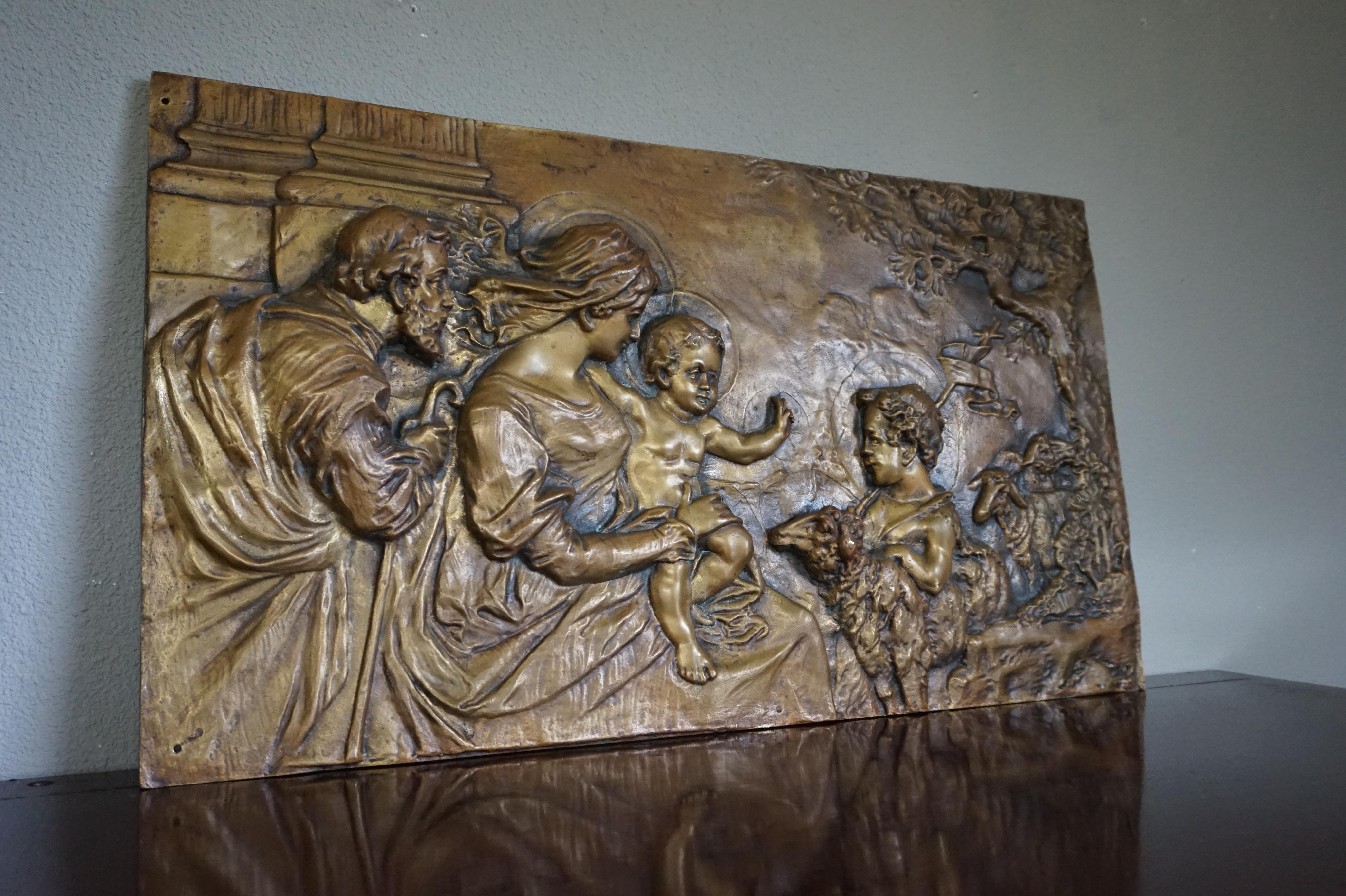 Symbolic and meaningful work of religious art.

Firstly, what we love about this rare (and possibly unique) bronze wall plaque is the carefree nature and the positivity that it radiates. Joseph is looking at Mary and the child Jesus and together
