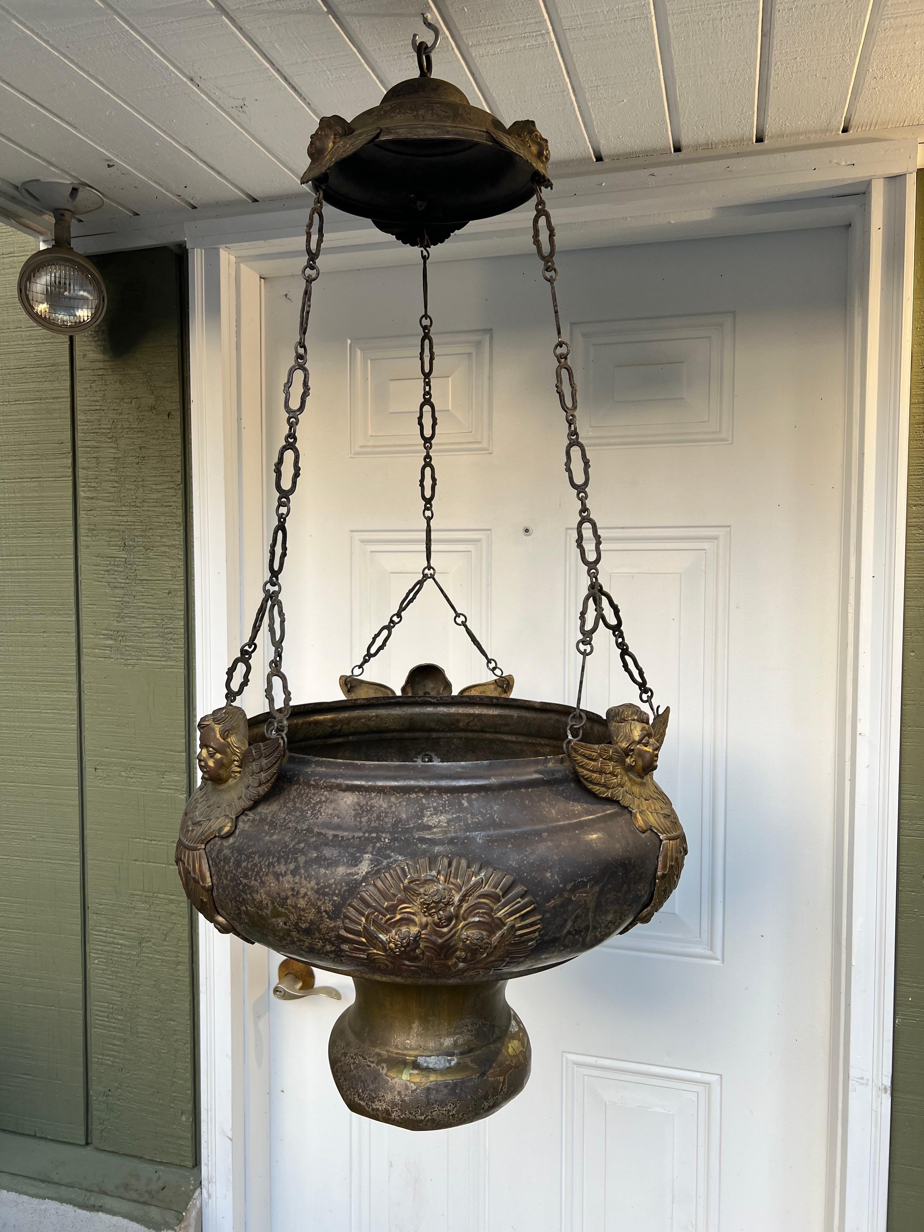 Antique Religious Thurible/Censor/Font/Planter or Chandelier. This was possibly a church thurible for burning incense in or a water font or baptismal font. Use as a planter to hang a fern in or turn into a ceiling fixture. Adorned with cherubs and
