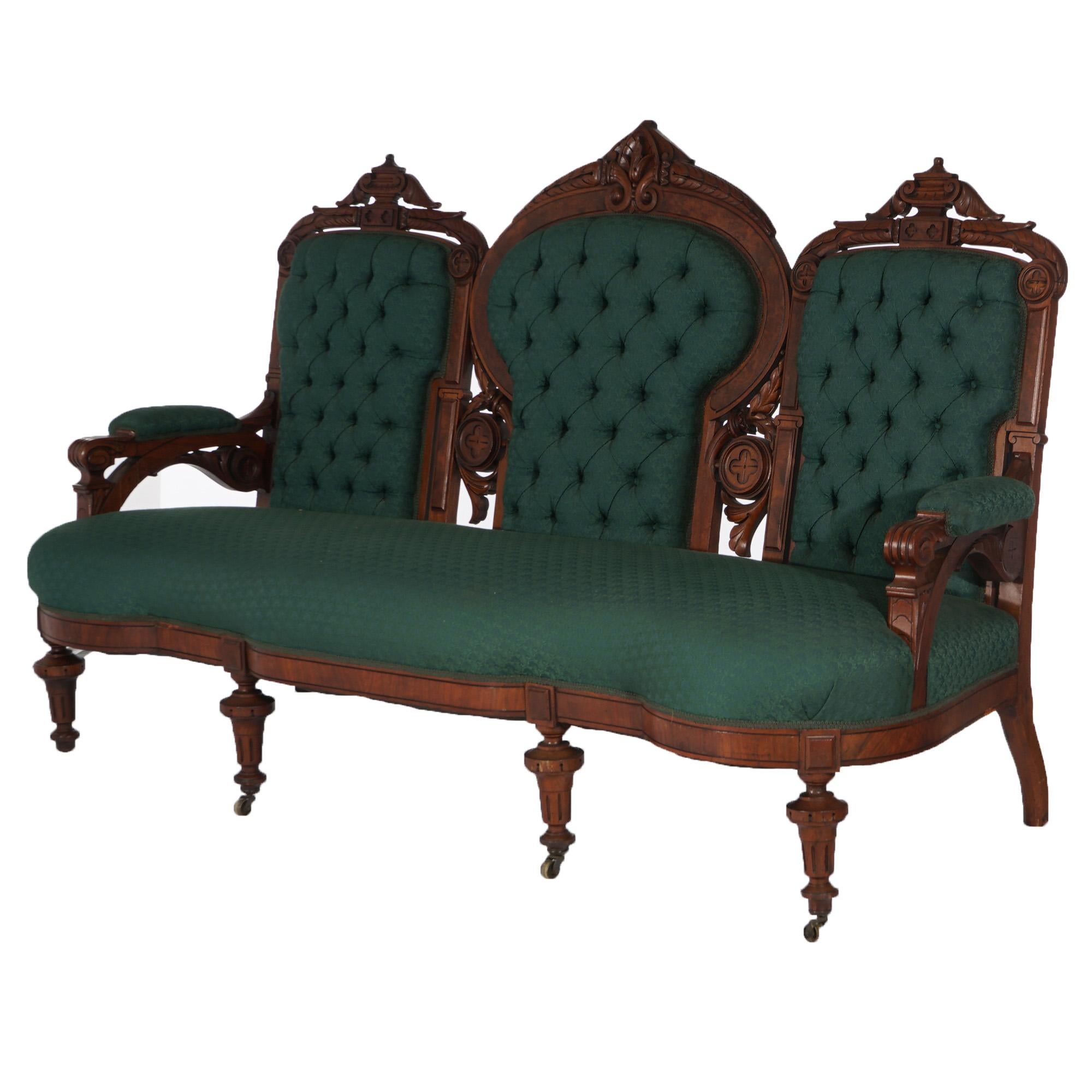 ***Ask About Reduced In-House Delivery Rates - Reliable Professional Service & Fully Insured***
Antique Renaissance Carved Walnut & Burl Upholstered Button-Back Triple Sofa with Carved Crests and Balustrade Legs, C1880

Measures - 44.5