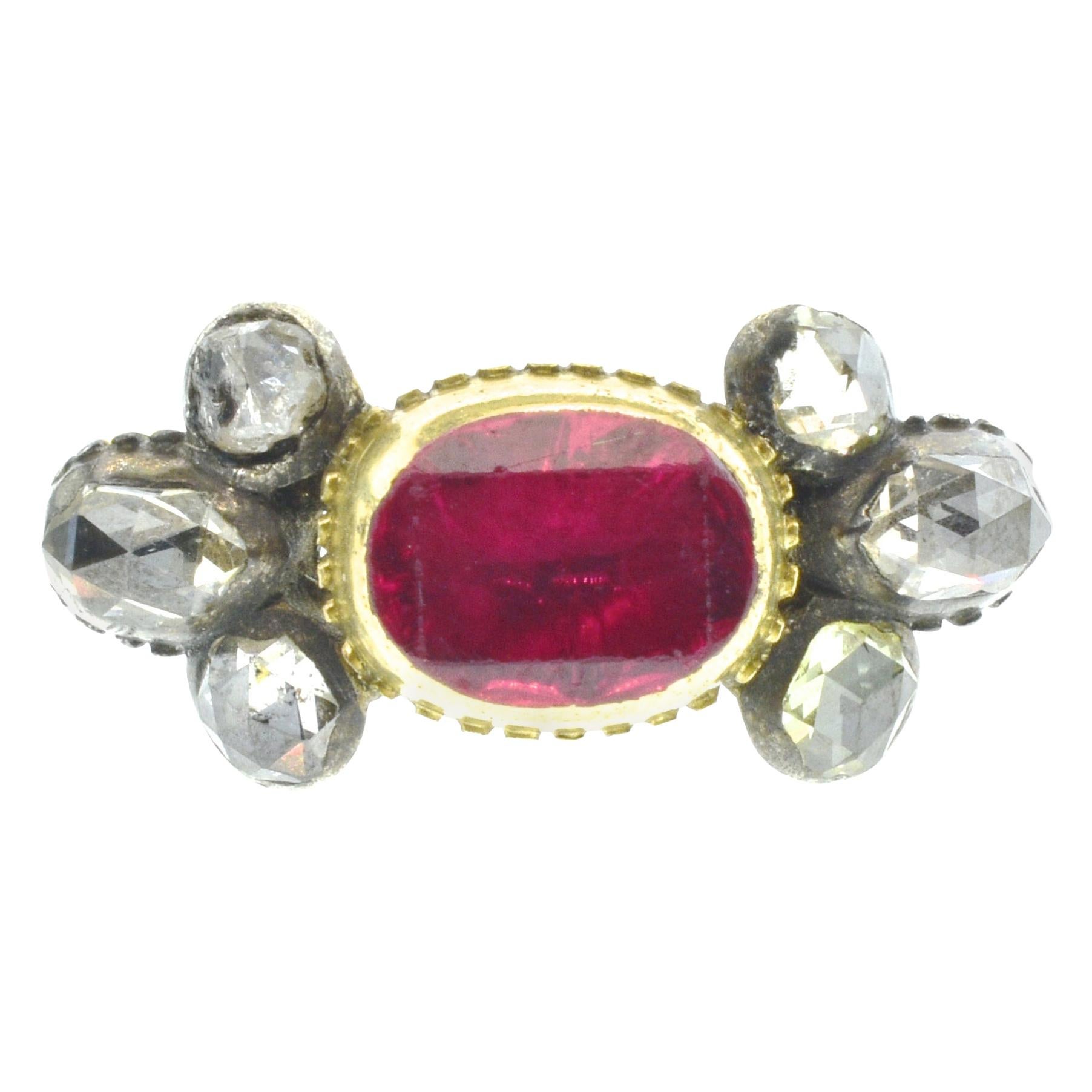 Antique period natural Spinel, diamond and enamel ring. In very good condition,  for its age, this impressive 18th century ring tests to be more than 18K gold (probably 20k), it centers an oval bright red natural Spinel (measuring 8.3 by 6.7 mm), in
