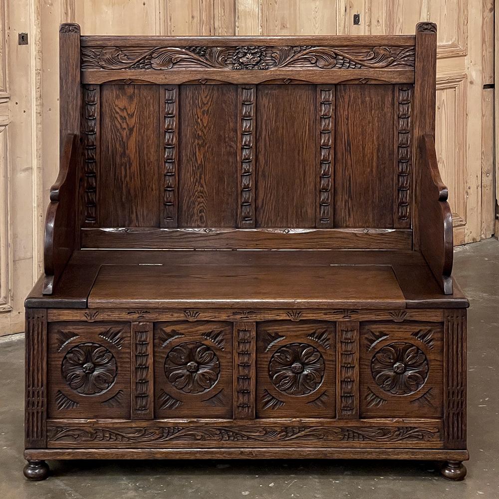 Antique Renaissance hall bench is a wonderful example of the genre, produced on a relatively diminutive scale making it easy to accommodate niches or cozy spaces. handcrafted from solid oak to last for generations, it features timeless carved detail