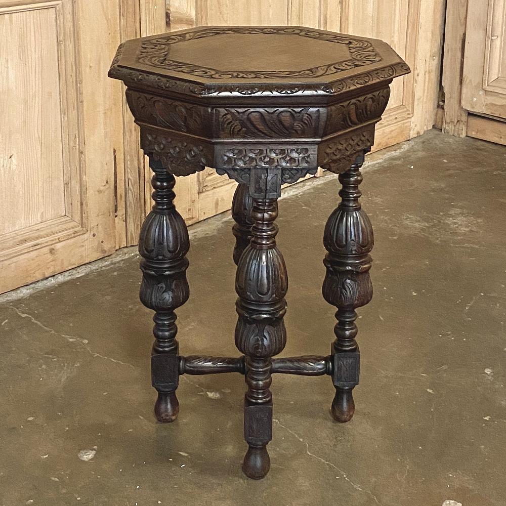 Antique Renaissance octagonal lamp table ~ end table was fashioned from solid oak, and features carved detail from the surface to the teardrop feet! Octagonal top is lavished with gadrooned edges and foliate carvings, supported by a finely carved 8
