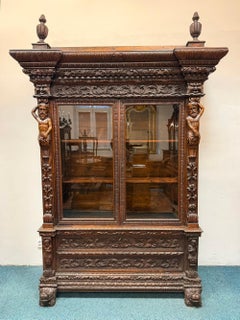 Antique Renaissance Revival Carved Oak Cabinet with Figural Supports