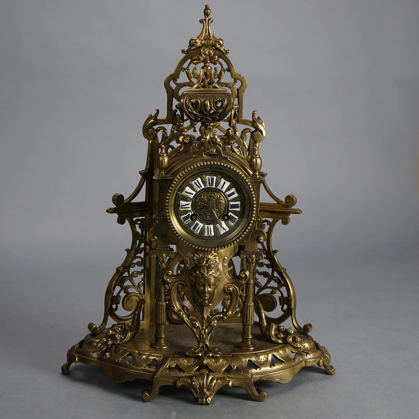 Ancienne horloge figurative en bronze coulé de style renaissance avec masque de femme et boîtier à feuillage percé, C1870

Dimensions - 18,25 