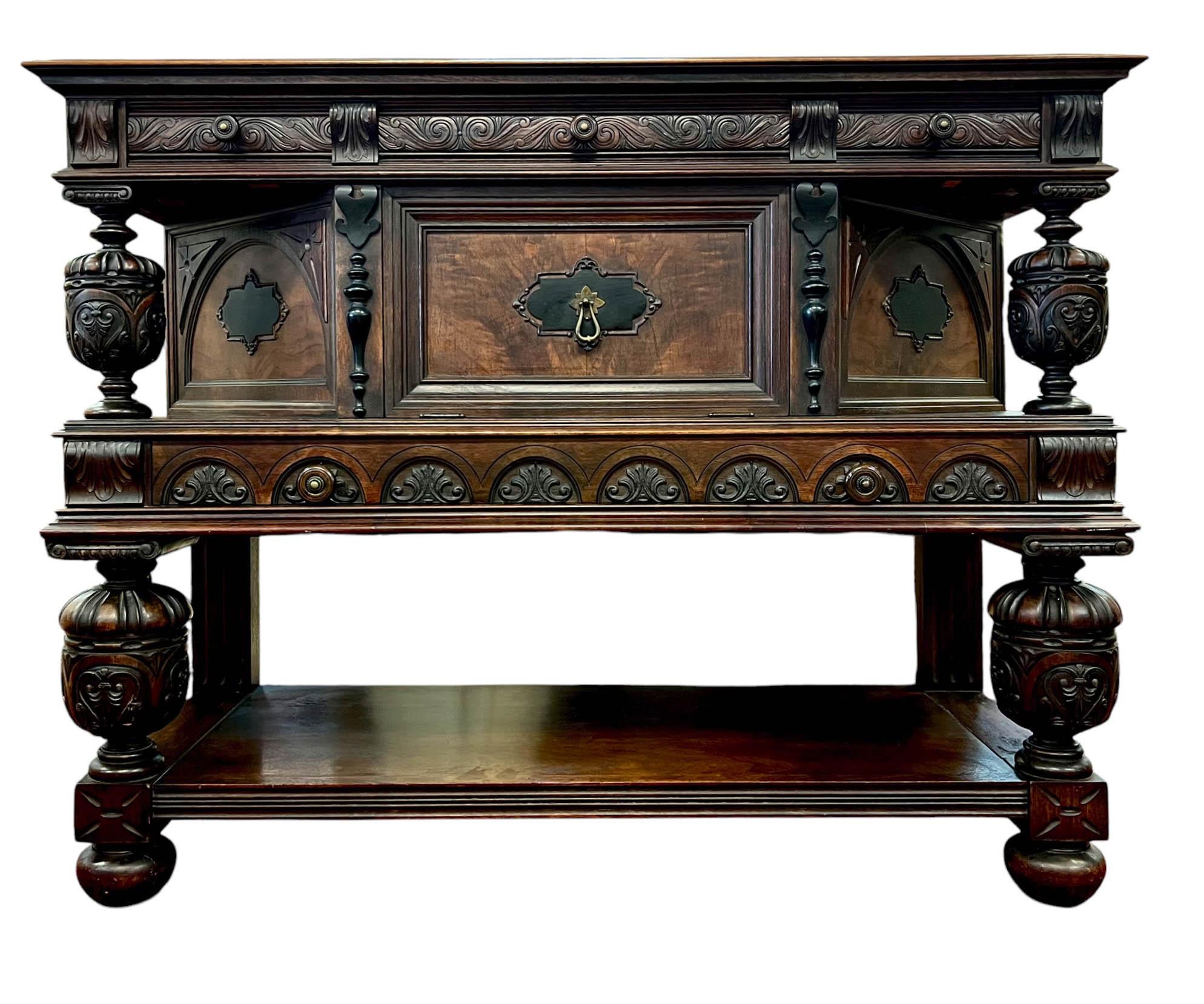Antique Renaissance Credenza/Sideboard American Victorian, c. 1880–1900

This piece represents the Renaissance Revival style that flourished in the late Victorian era, with clear Jacobean and Flemish influence visible in its carved supports and