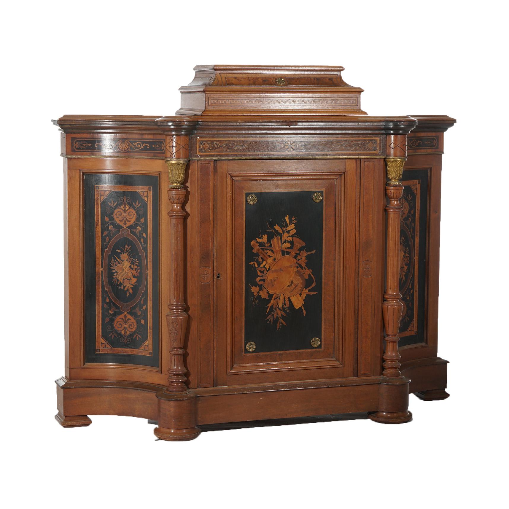 ***Ask About Reduced In-House Delivery Rates - Reliable Professional Service & Fully Insured***
An antique Renaissance Revival Pottier & Stymus credenza offers walnut construction in stylized demilune form and having marquetry inlaid reserves,