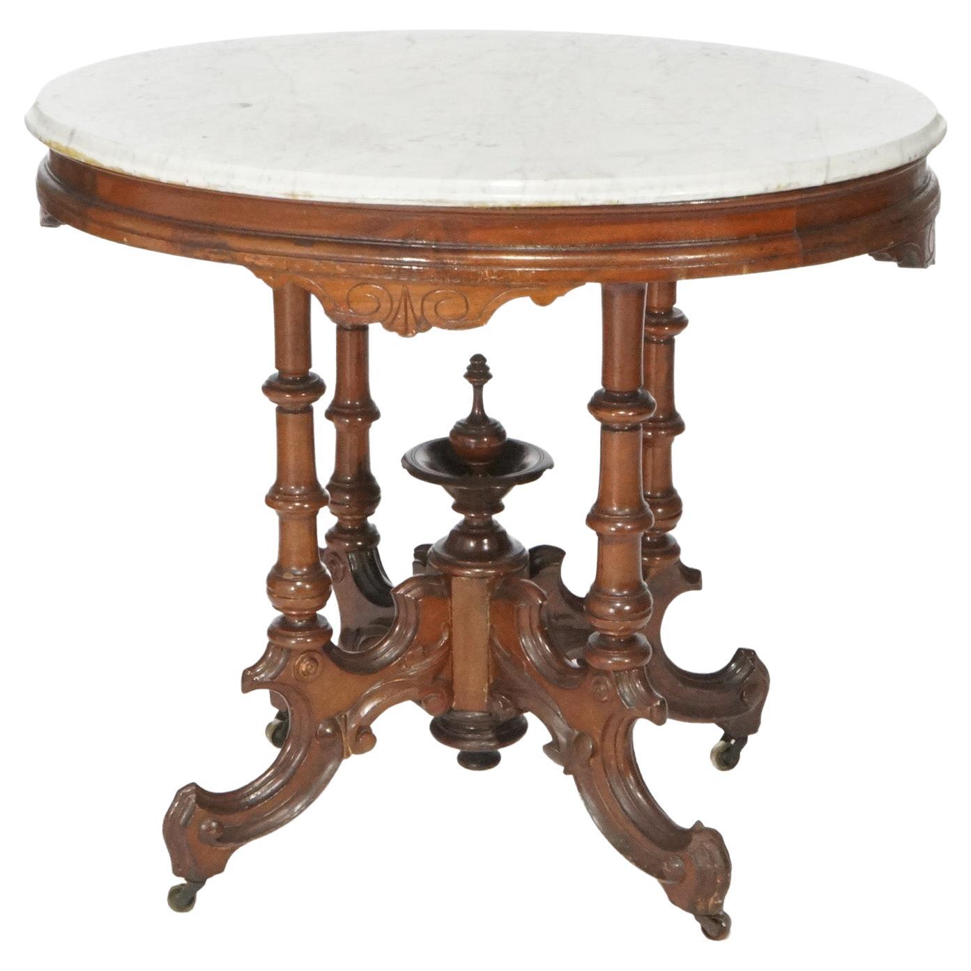 Antigua mesa de salón ovalada de nogal renacentista con tapa de mármol, hacia 1890