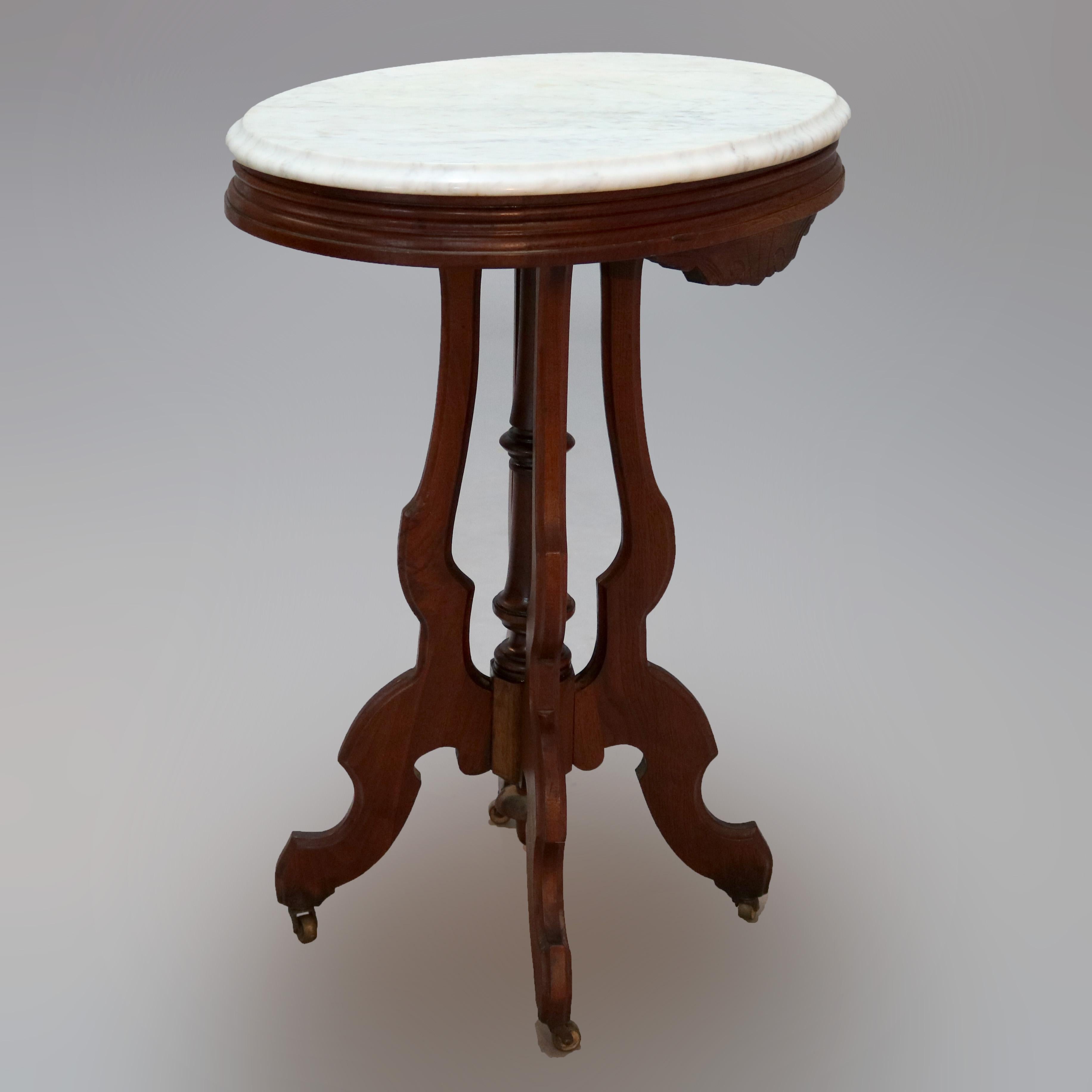 Wood Antique Renaissance Revival Walnut Oval Marble Top Table, Circa 1890