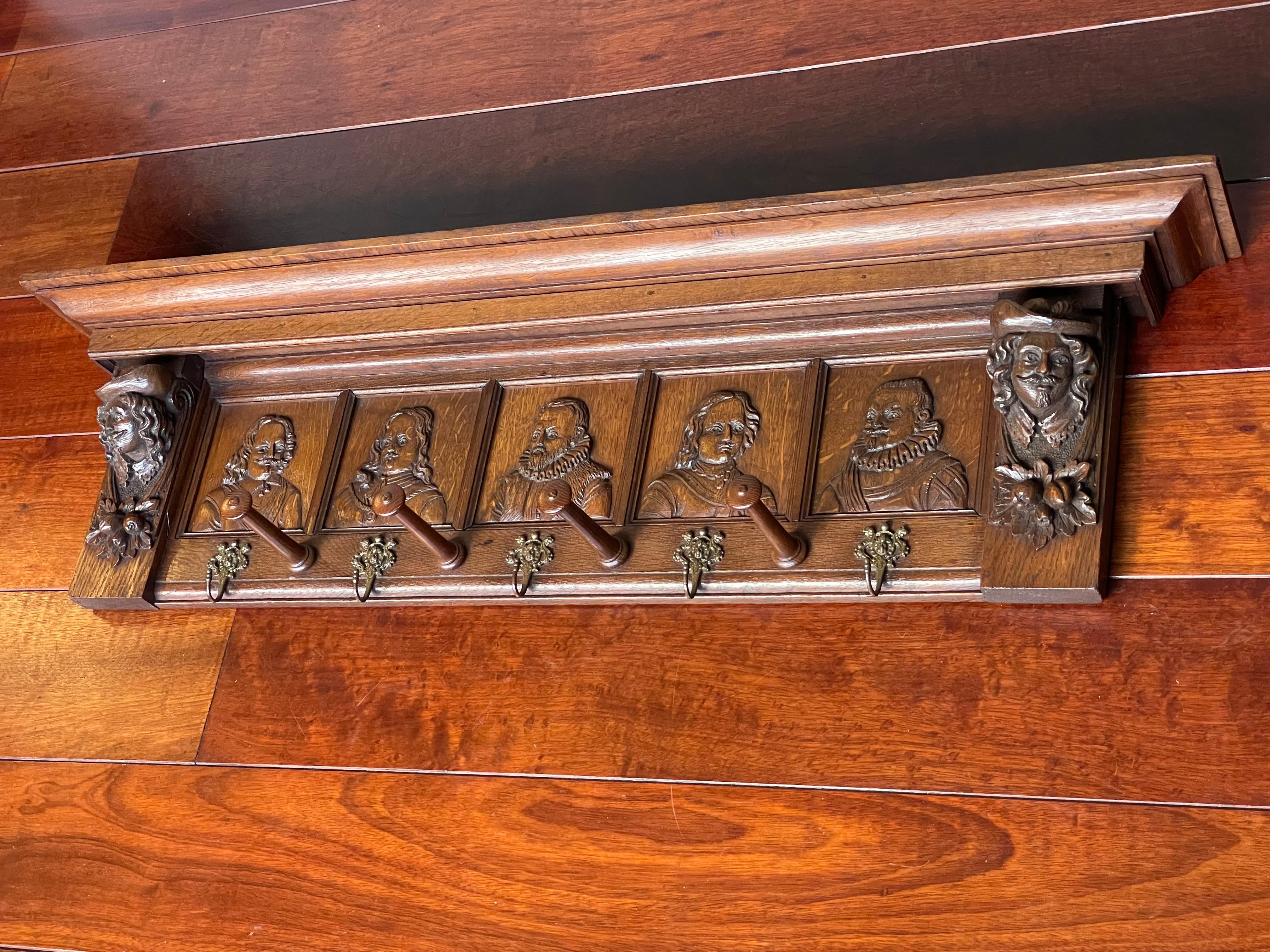 Unique and incredibly stylish Dutch antique coat rack, celebrating 'De Nachtwacht'.

This striking antique Dutch coat rack is special, practical and highly decorative. It is special and unique, because this Renaissance Revival wall coat rack was