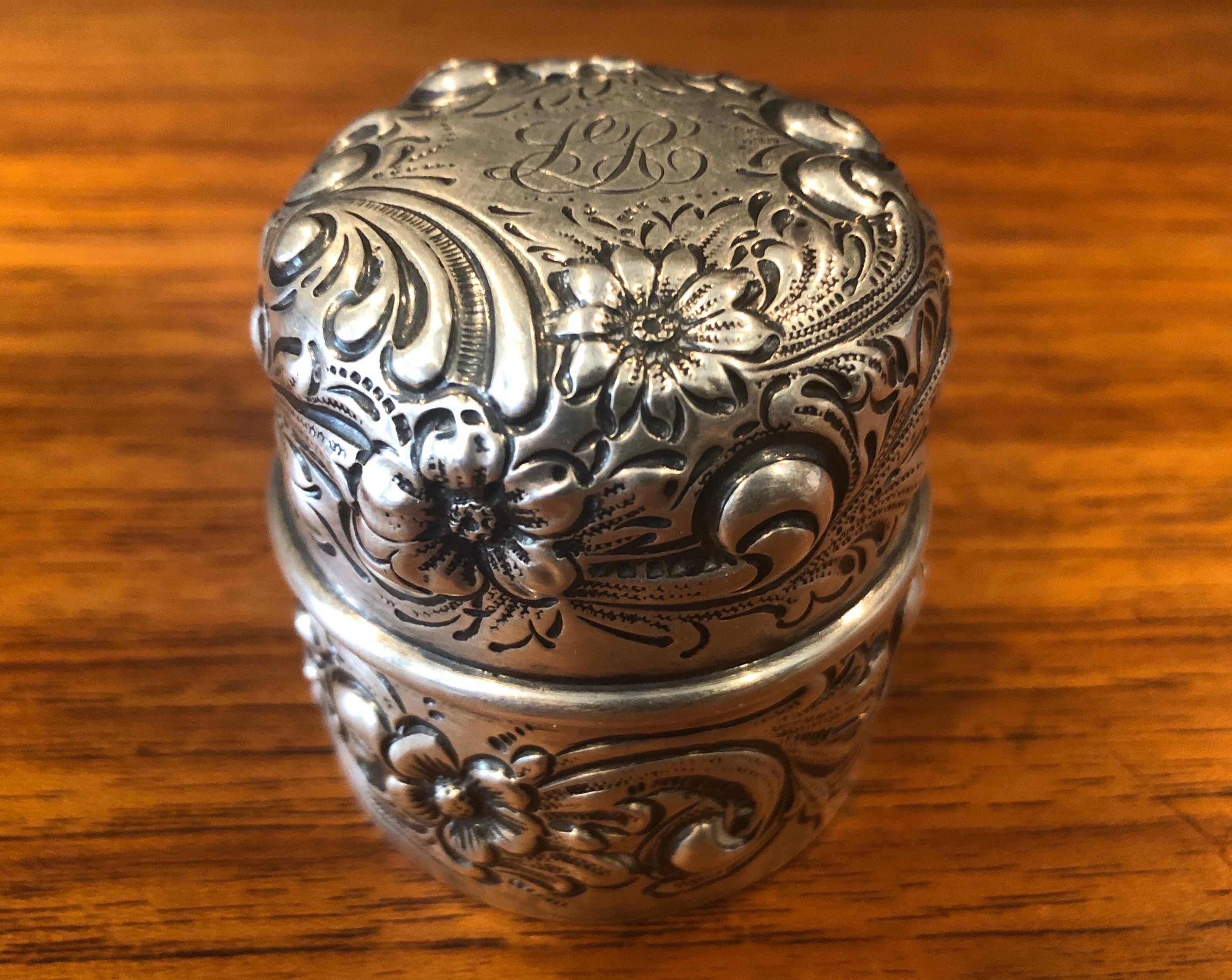 A rare antique hand-hammered repousse sterling silver inkwell by Howard & Co. New York, circa 1903. The inkwell has a single back hinge to open the lid and a bun cap and the glass liner. Stamped on the bottom: “Howard & Co.