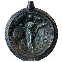 Ancienne reproduction de la lampe à huile en bronze de l'époque romaine Annum Novum Felicem