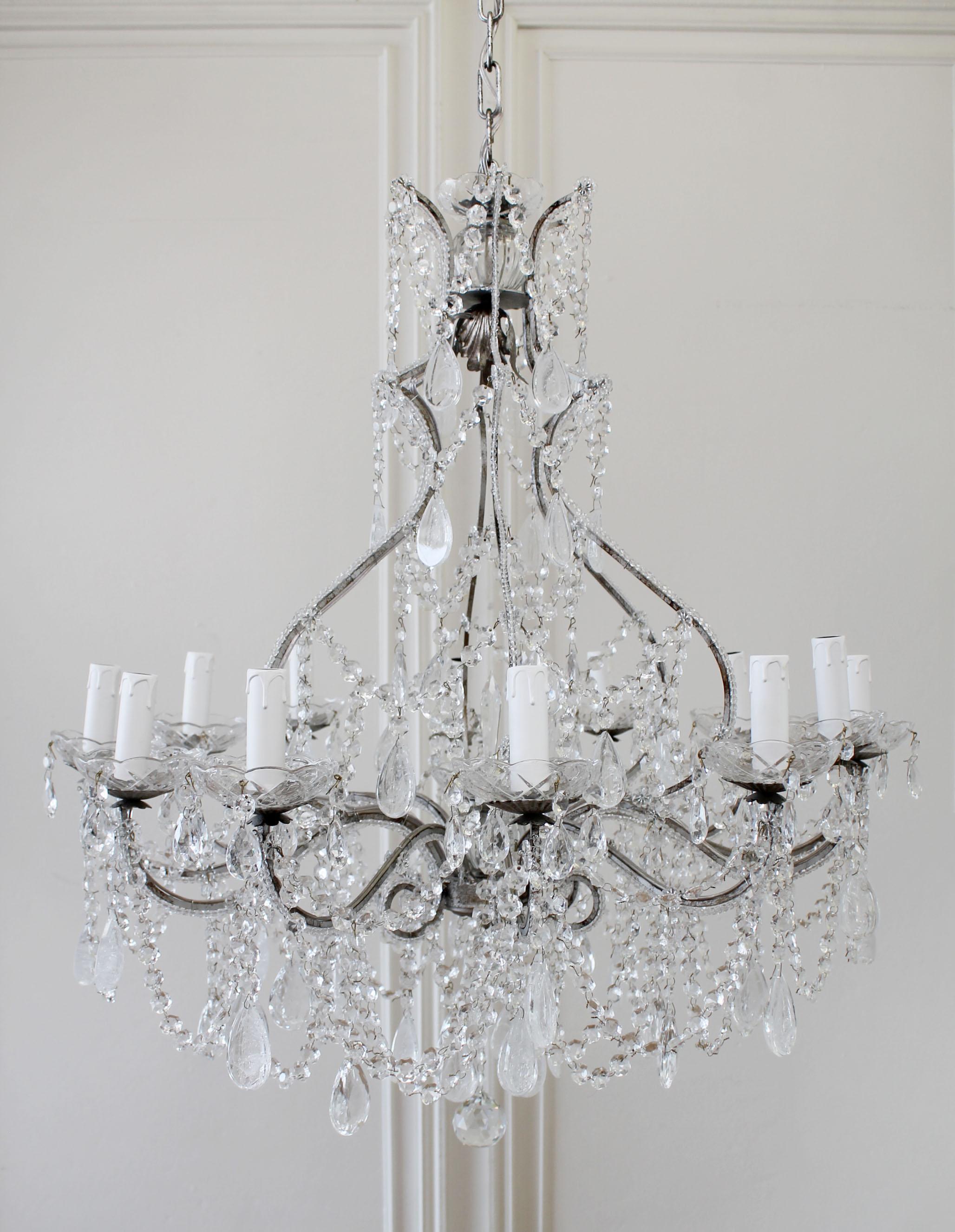 Antique reproduction Italian chandelier with beaded arms and rock style crystals
These are part of our new collection for Full Bloom Cottage. We've recreated a new line of vintage inspired chandeliers, all custom and hand made in Italy with a rock