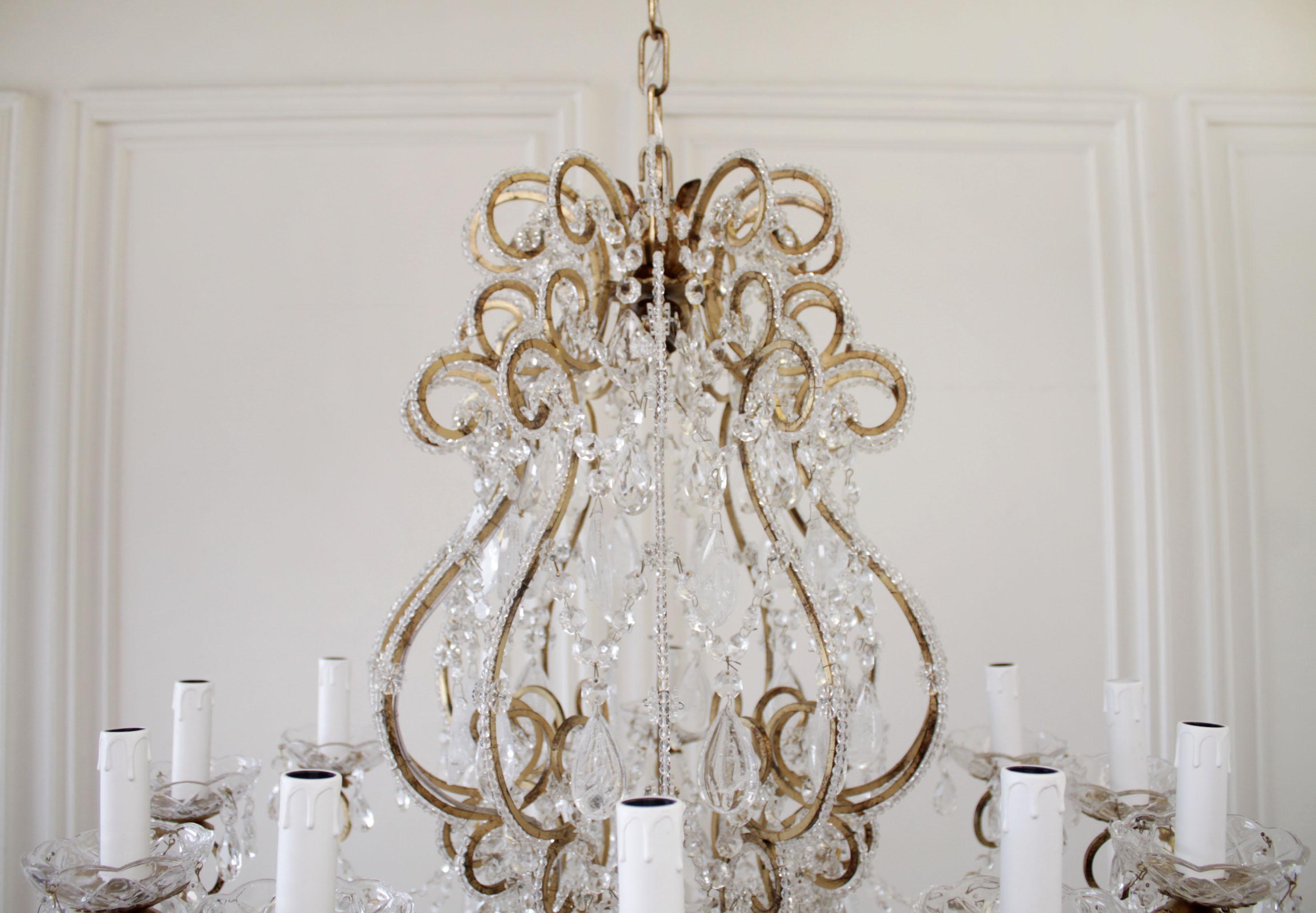 Antique reproduction Italian chandelier with beaded arms and rock style crystals
These are part of our new collection for Full Bloom Cottage. We've recreated a new line of vintage inspired chandeliers, all custom and handmade in Italy with a rock