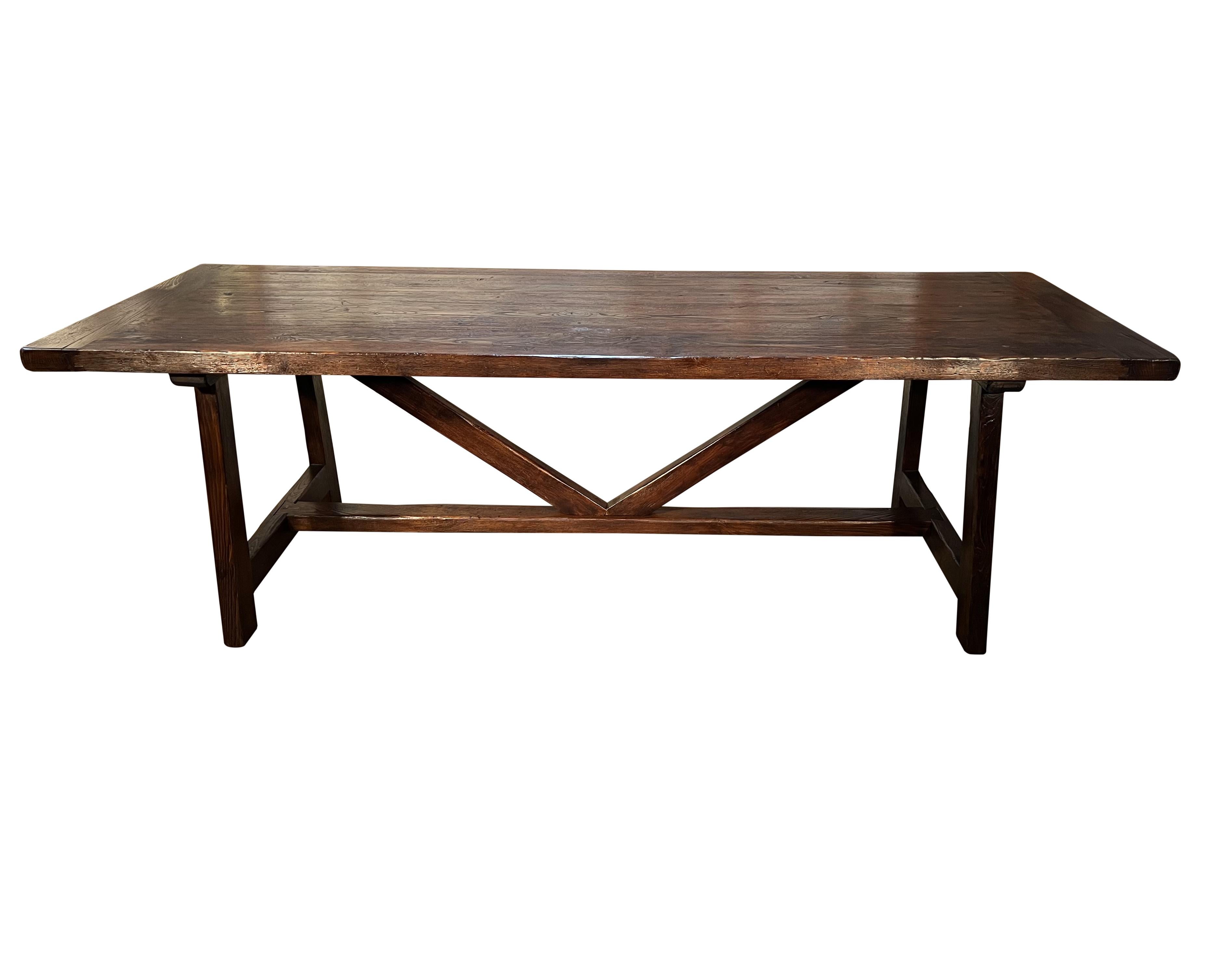 Made in Italy Antique Reproduction of a Late 17th Century Italian chestnut Fratino style table features solid top planks with end frames and a base with crosspieces and wood joinery pins.

Showed in the size 96” Width 36” Depth 30” Height

With is