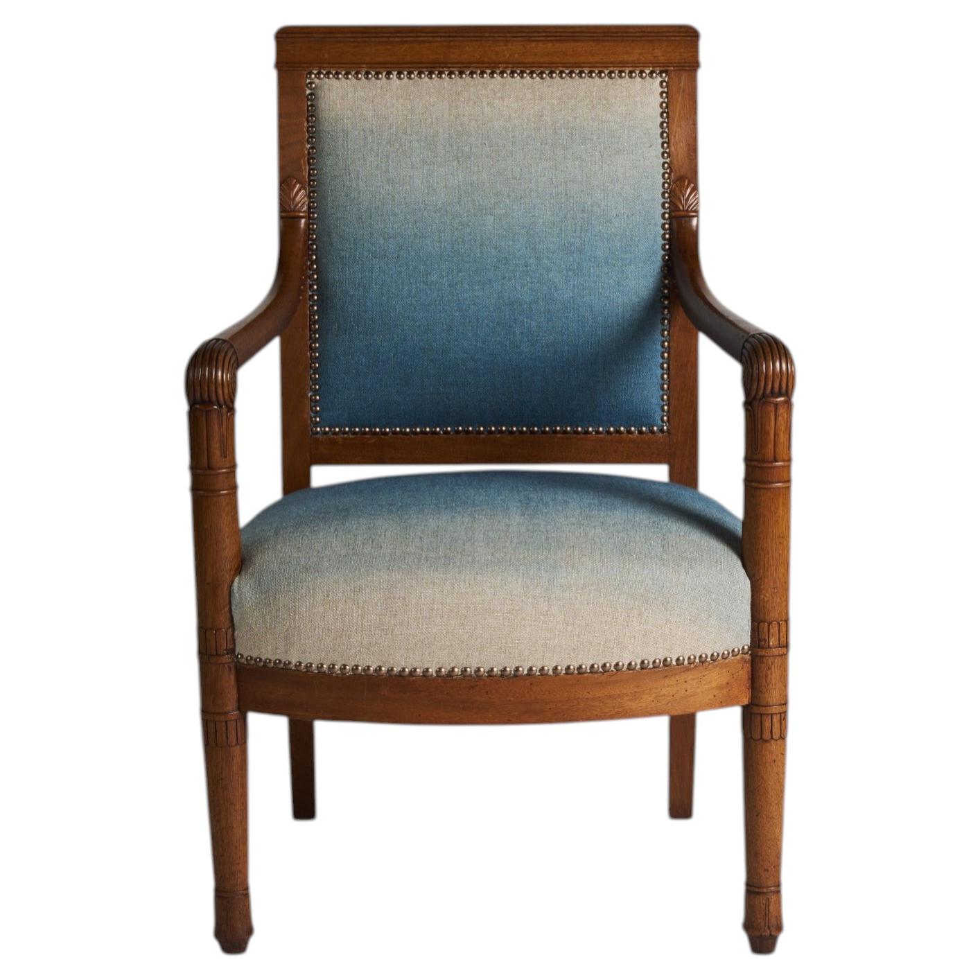 Sillón antiguo de época de restauración