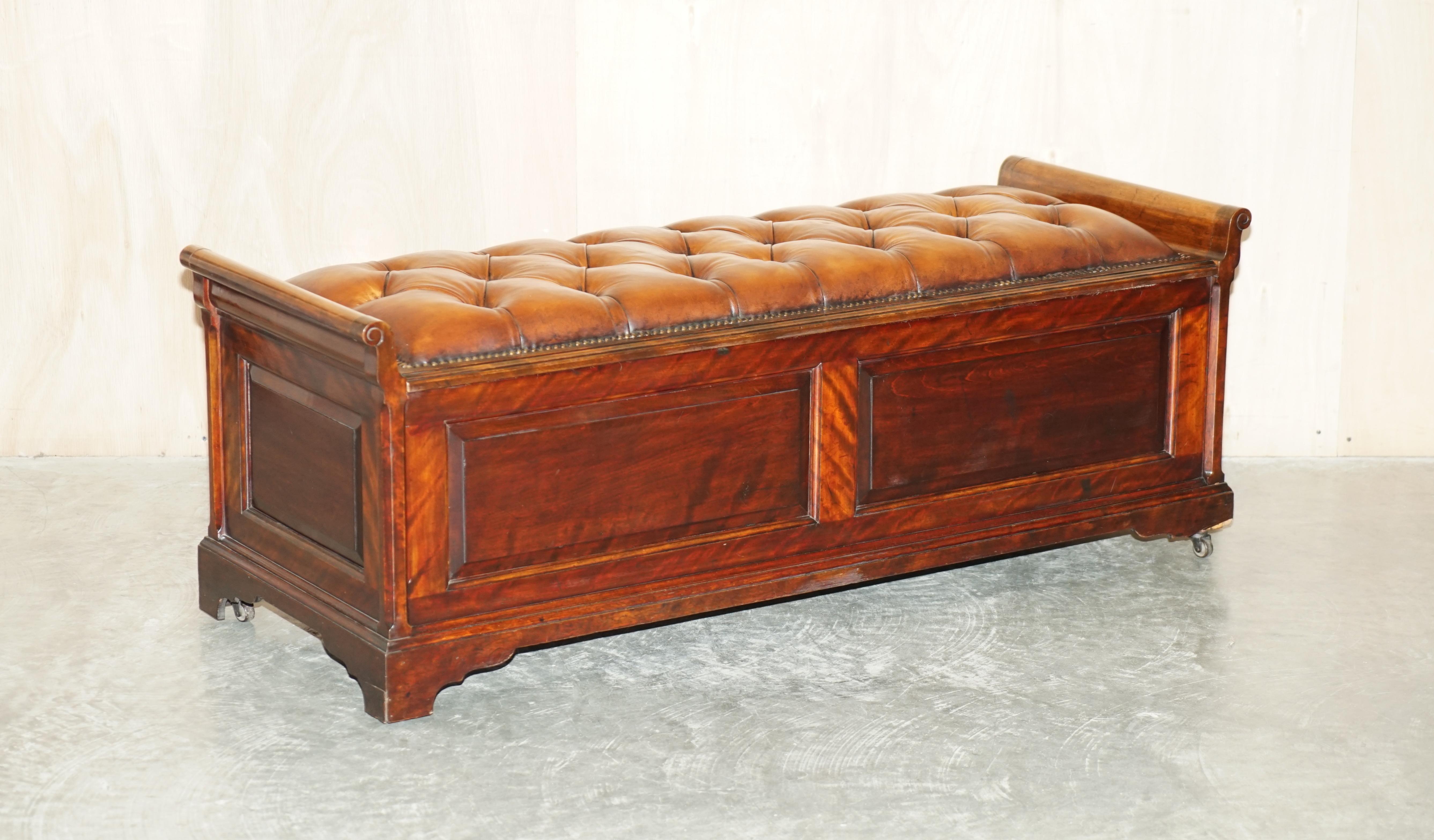 We are delighted to offer for sale this very large, fully restored Victorian circa 1860-1880, hand dyed cigar brown leather hall bench or ottoman with huge amounts of internal storage with the flamed mahogany frame.

This is one of the most