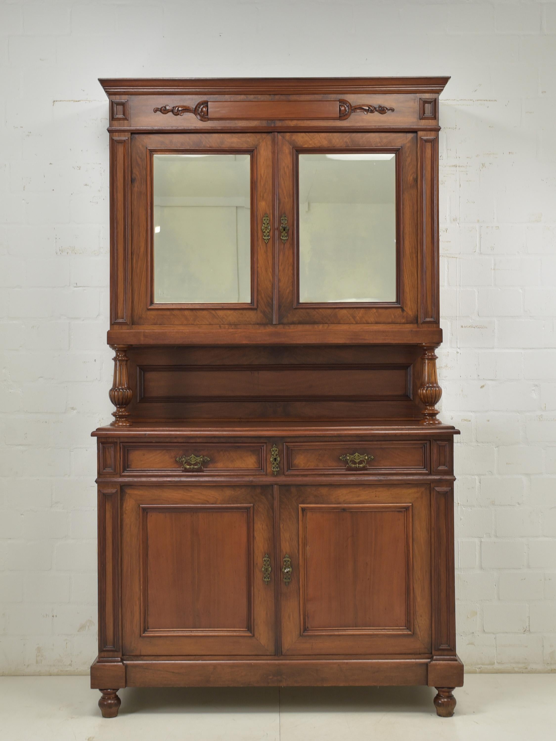 Antique Sideboard from the Historicism Era (circa 1900)

Description:

This exquisite sideboard, crafted from a combination of solid walnut and oak, embodies the grandeur and craftsmanship of the Historicism era (circa 1900). Restored to its former