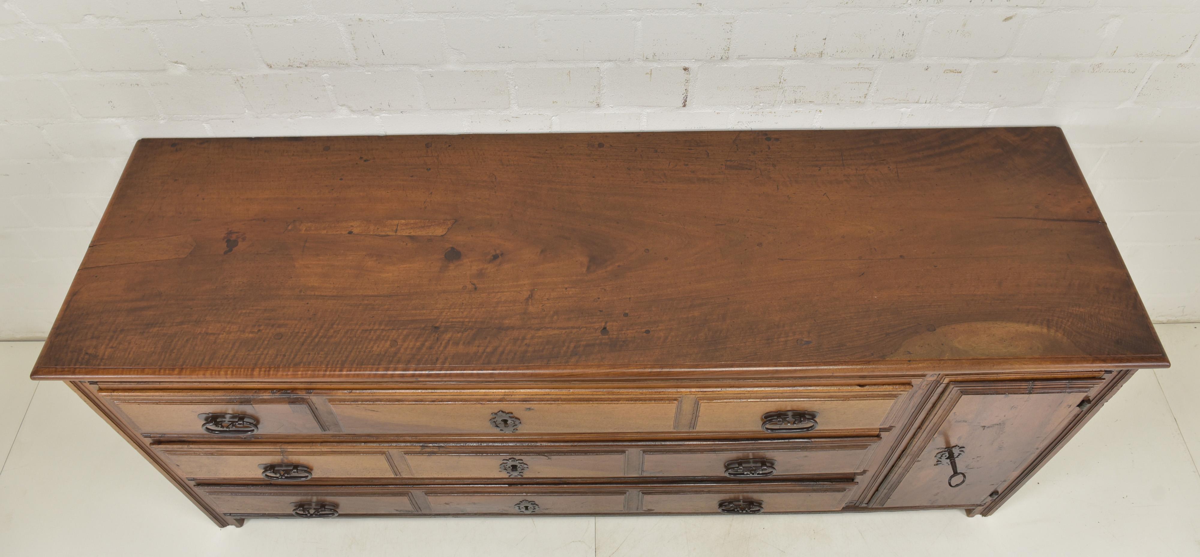 Antique Spanish Lowboard (circa 1740)

Description:

This exquisite lowboard, crafted from solid walnut, embodies the rich heritage and craftsmanship of 18th-century Spain. Restored to its former glory, this versatile piece seamlessly blends into
