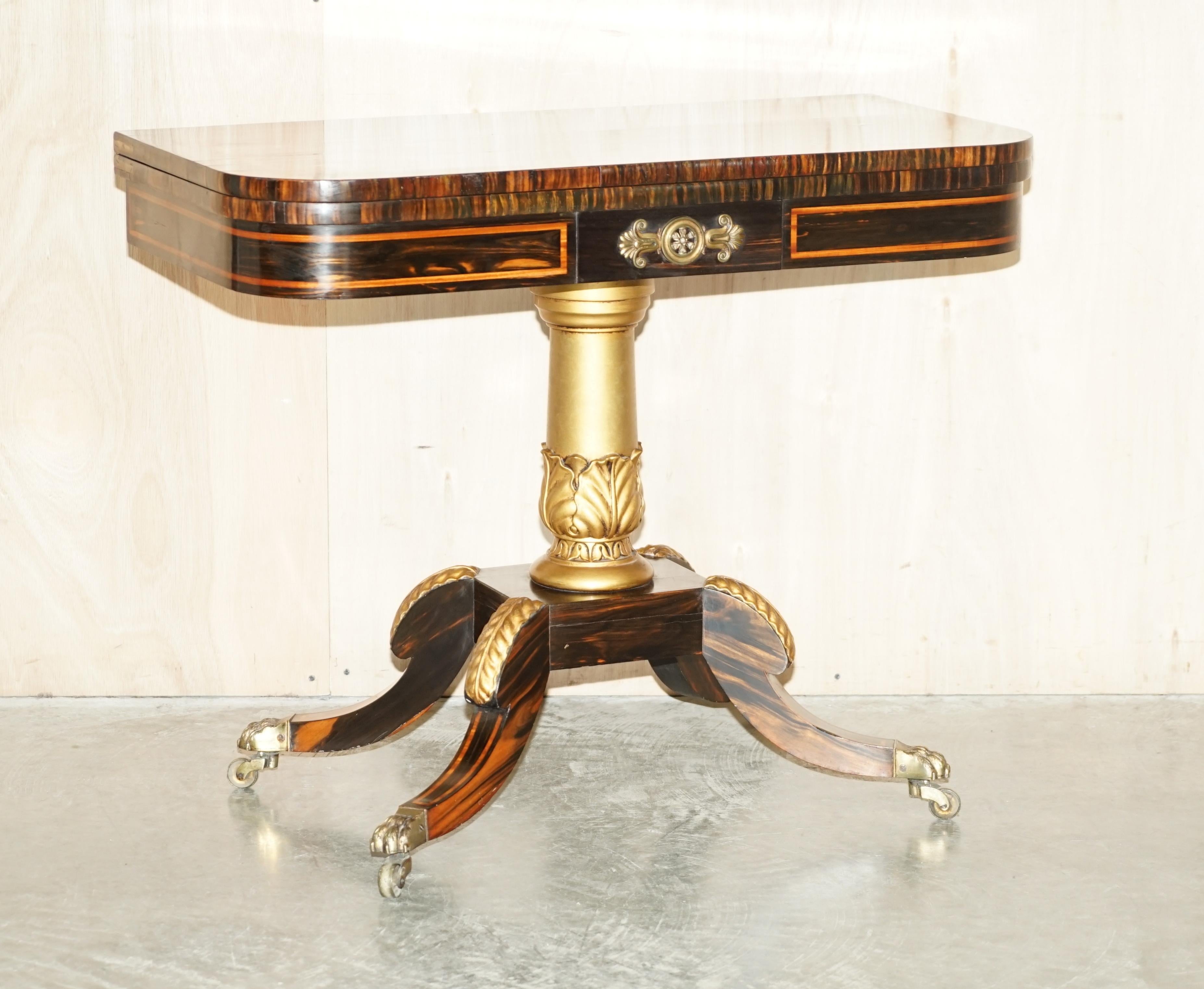 Royal House Antiques

Royal House Antiques is delighted to offer for sale this exquisite, fully restored, hand made in England William IV circa 1830 Coromandel & Giltwood occasional table with baize lined card top inside 

A very rare example,