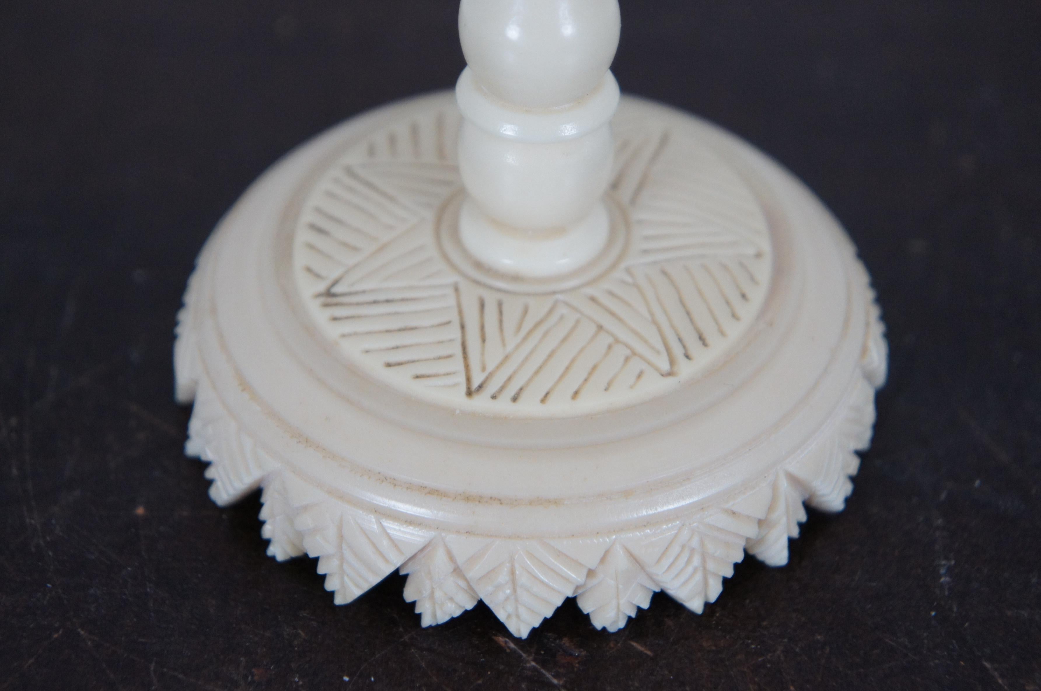 ivory puzzle ball on stand