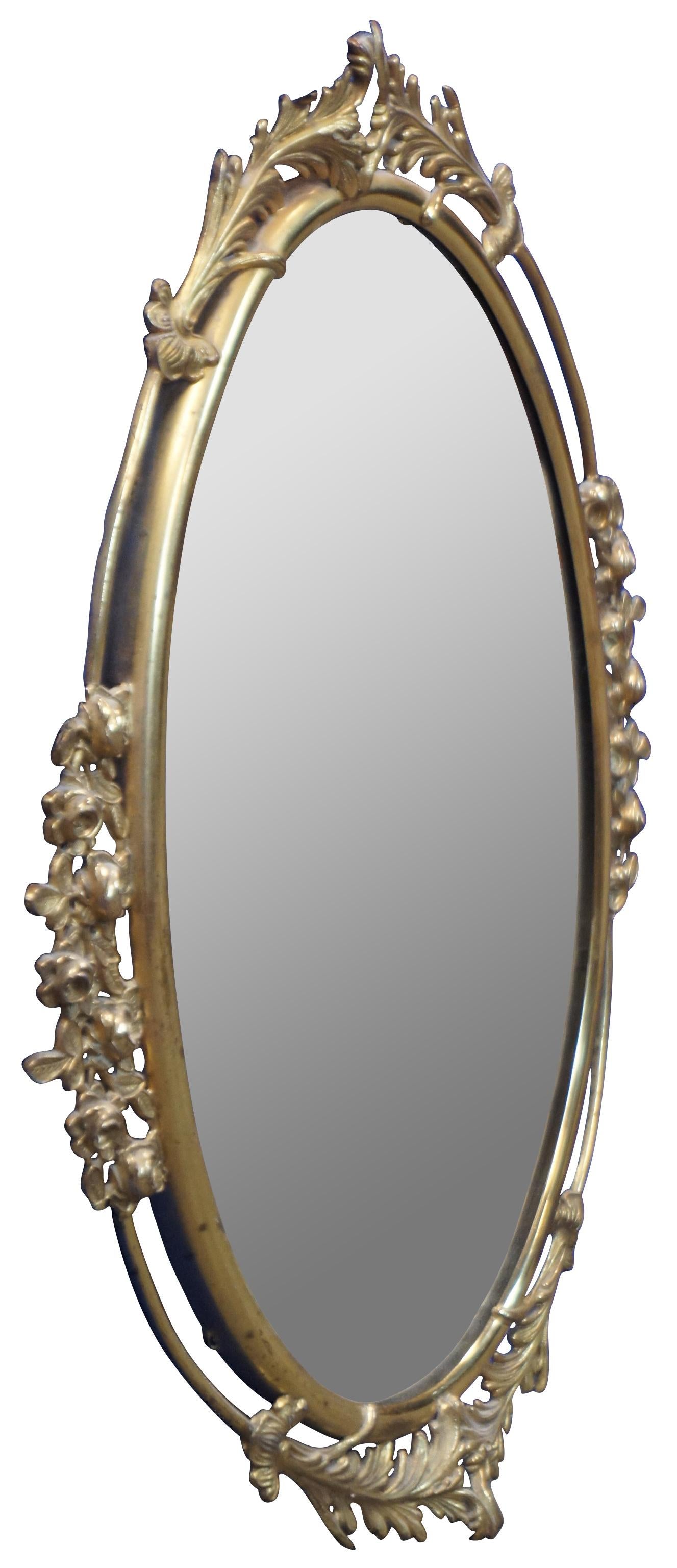 gold ornate oval mirror