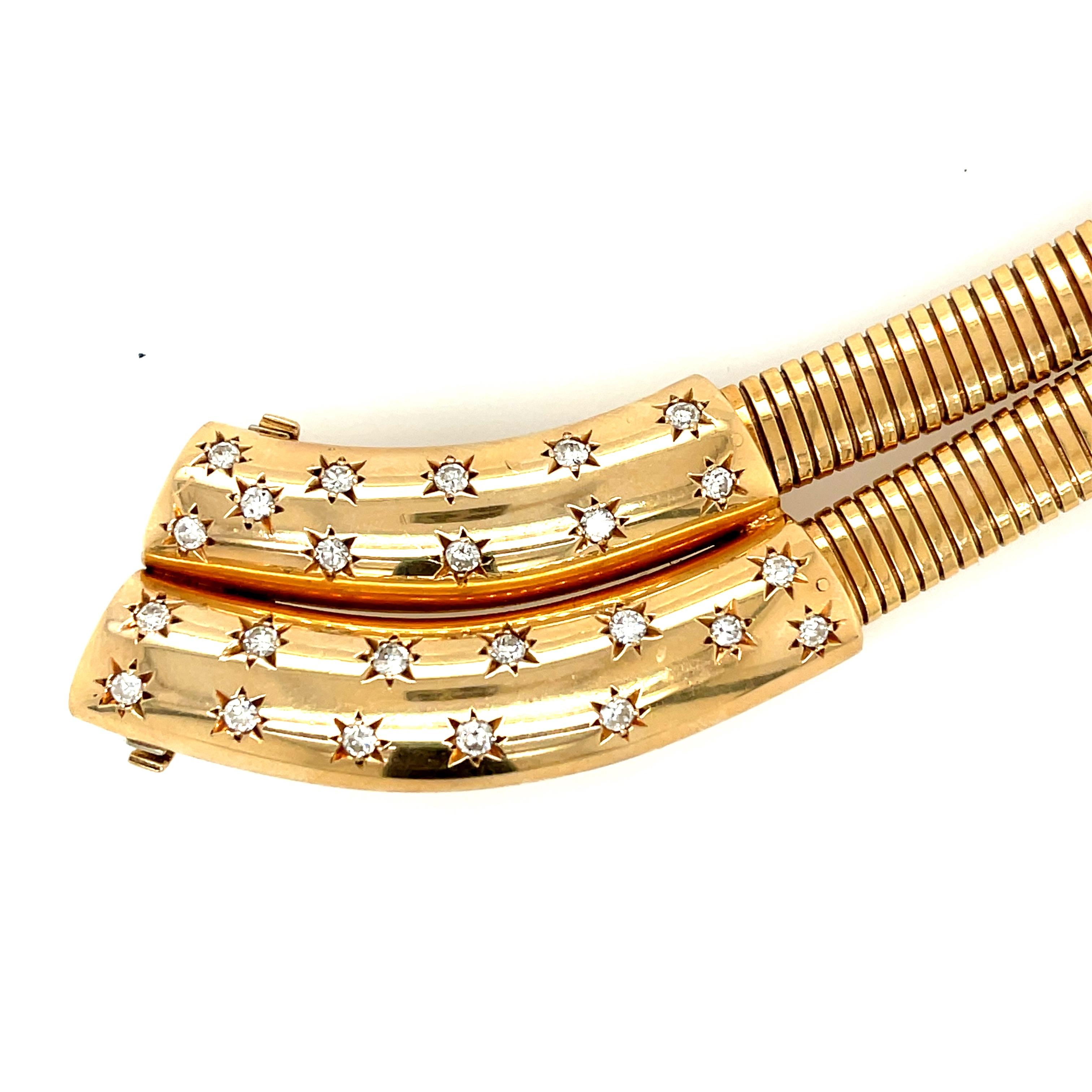 A fine Retro 14k yellow gold diamond double gas pipe necklace necklace circa 1940. This popular style necklace features stacked gas pipe tubogas necklaces, with a front section clasp that is set with diamonds. There are 24 diamonds that are Old