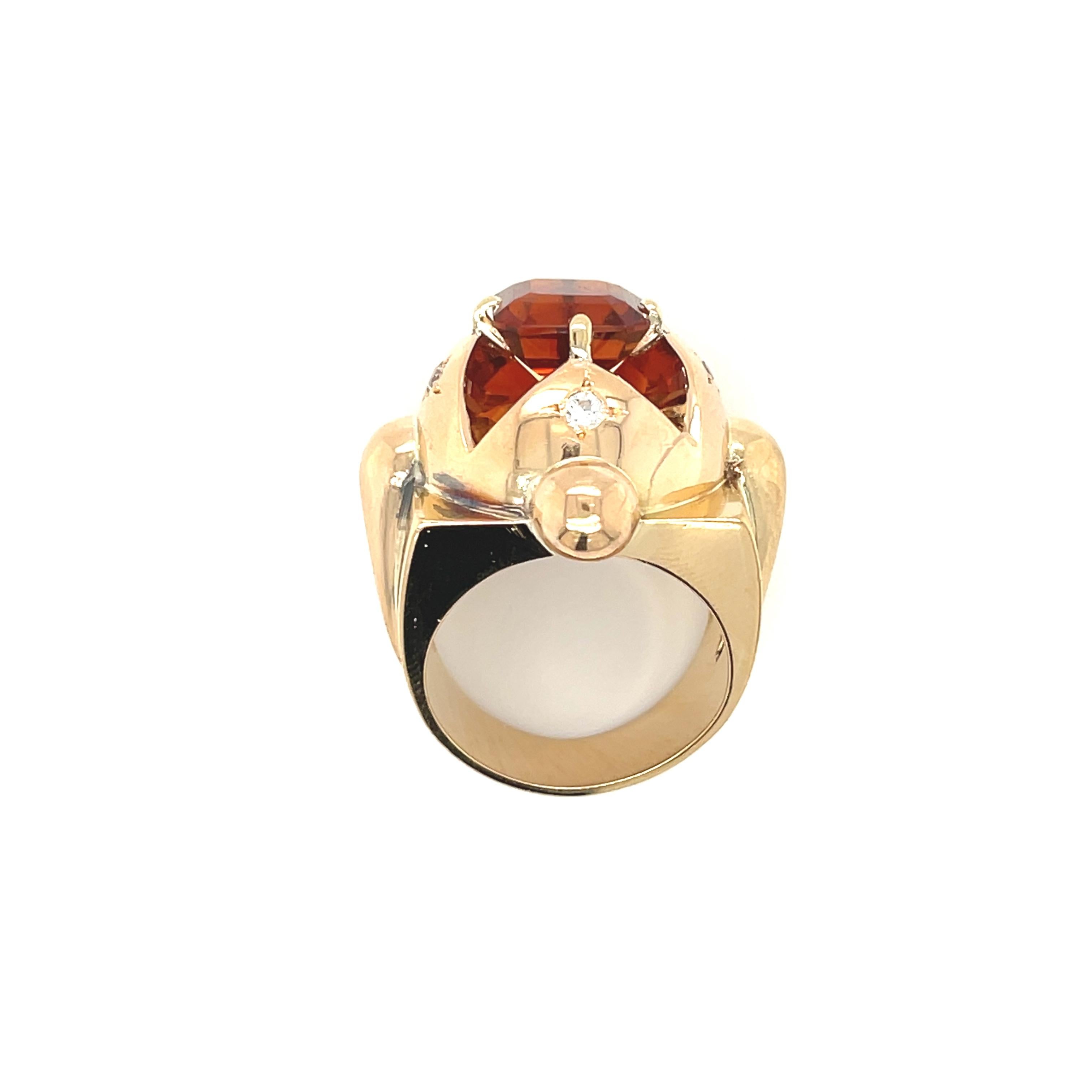 Antique Retro 18k yellow gold architectural dome ring set with diamonds and a Madeira topaz, circa 1940. This ring is a bold and dimensional ring with a unique look. The topaz seems to reflect off the bottom of the mounting. A beautiful ring to