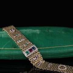 Bracelet à breloques de style rétro/Art déco en or jaune 14 carats et platine