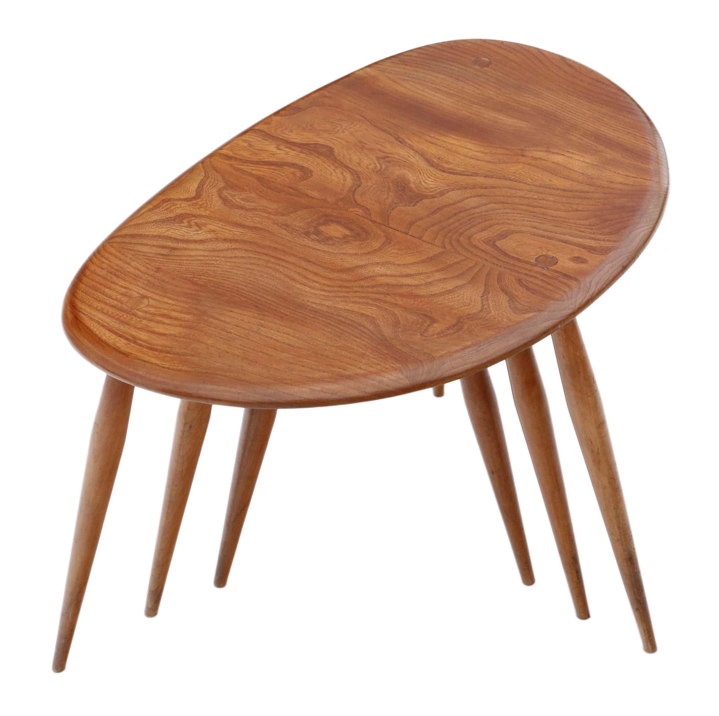 Antique retro quality Ercol nest of 3 tables C1970s, great design and shape, very sought after. Elm and beech construction.
 
Very attractive, with striking proportions and styling. 
 
No loose joints or woodworm.
Good age, colour and