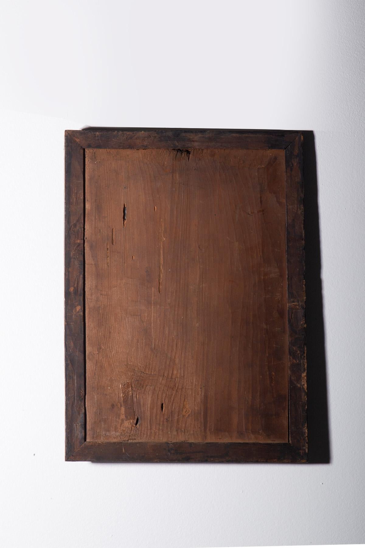 This captivating piece is a refined example of reverse glass painting, a precious technique that transports us back to early 19th-century China. The delicate and fragile glass surface serves as a portal to a composition suspended between dream and