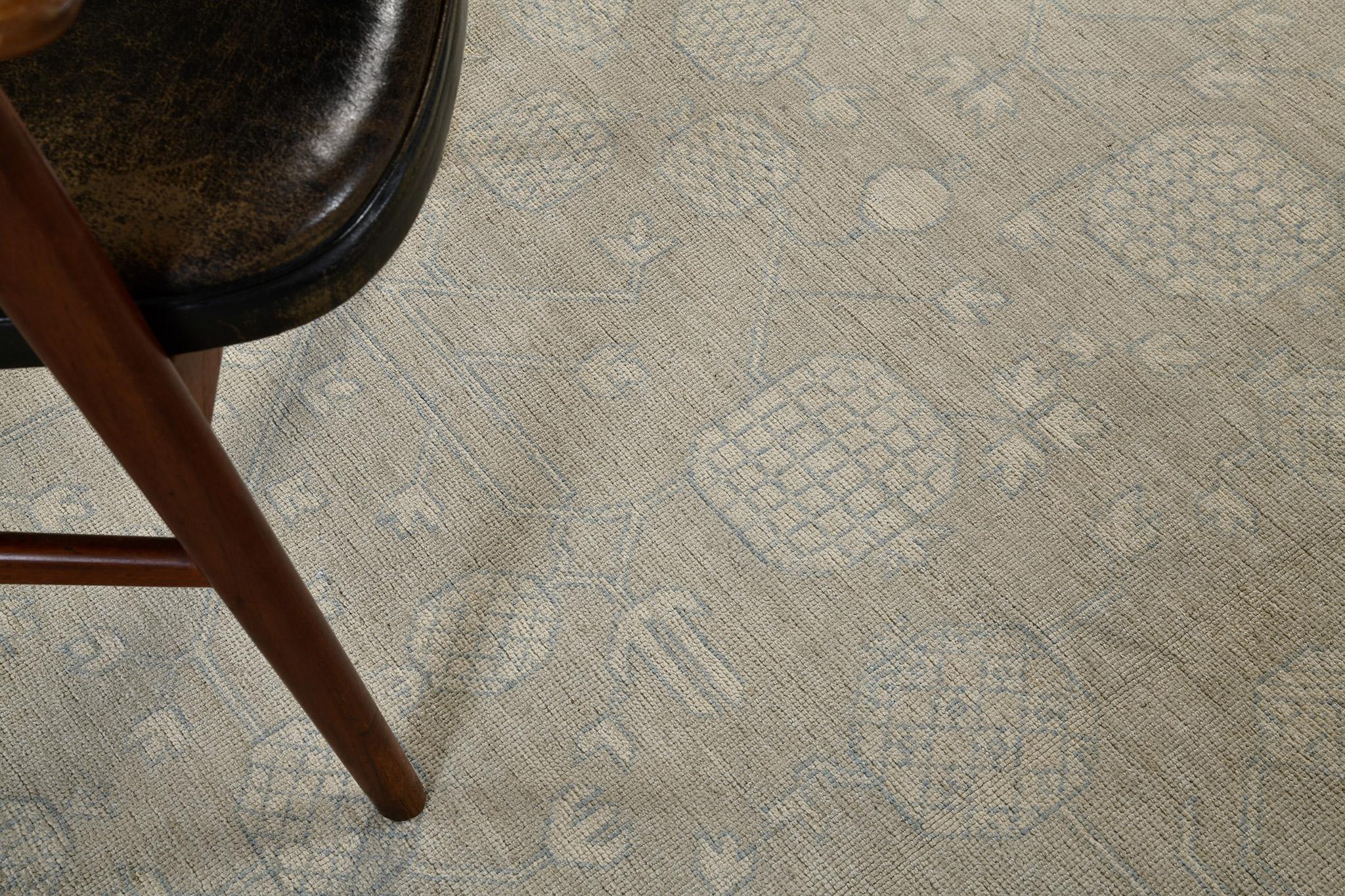 Our most impressive revived Khotan design rug of Safira Collection is perfect for your home spaces. It will prove its versatility because of the ashblue outline that turned into notable details and patterns. A field of muted cinnamon has its own