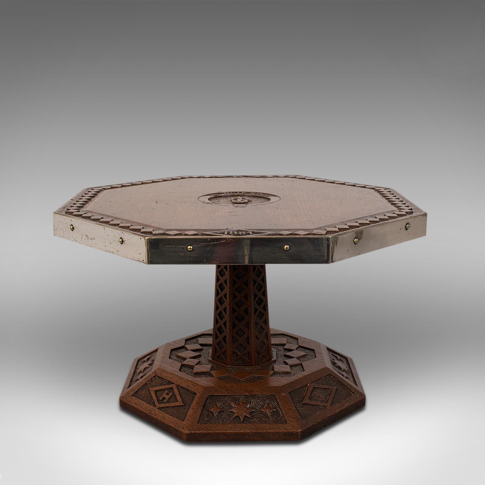 This is an antique revolving table-top platter. An English, oak octagonal Lazy Susan with ecclesiastical taste, dating to the Victorian period, circa 1884.

Prominent decorative serving platter with strong ecclesiastic or Masonic taste
Displaying