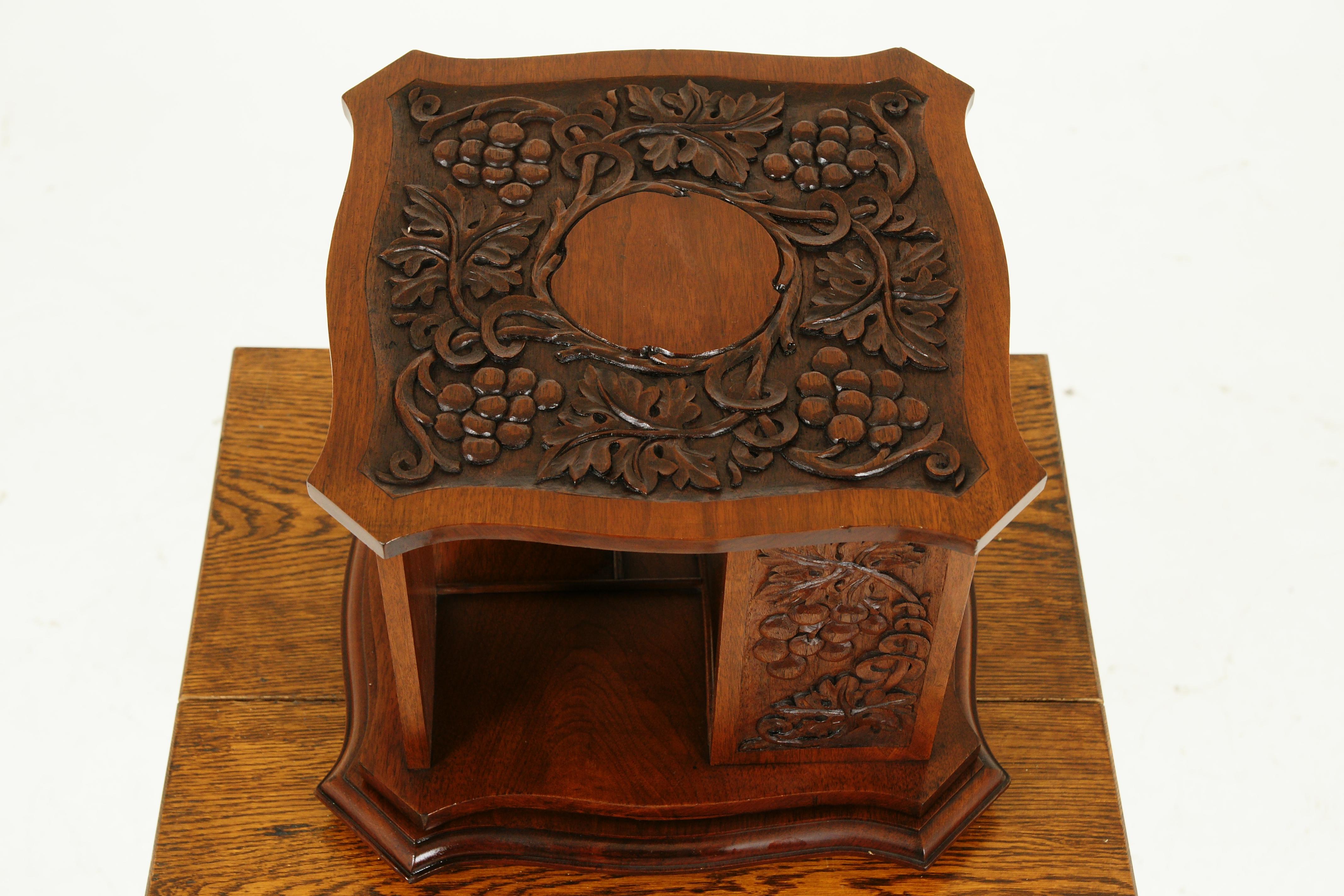 Antique revolving bookcase, Arts + Crafts, carved walnut tabletop bookcase, Scotland 1910, B2545

Scotland 1910
Solid walnut
Original finish
With attractive top with carved grapes and leaves
With carved panels to the four sides
With four book