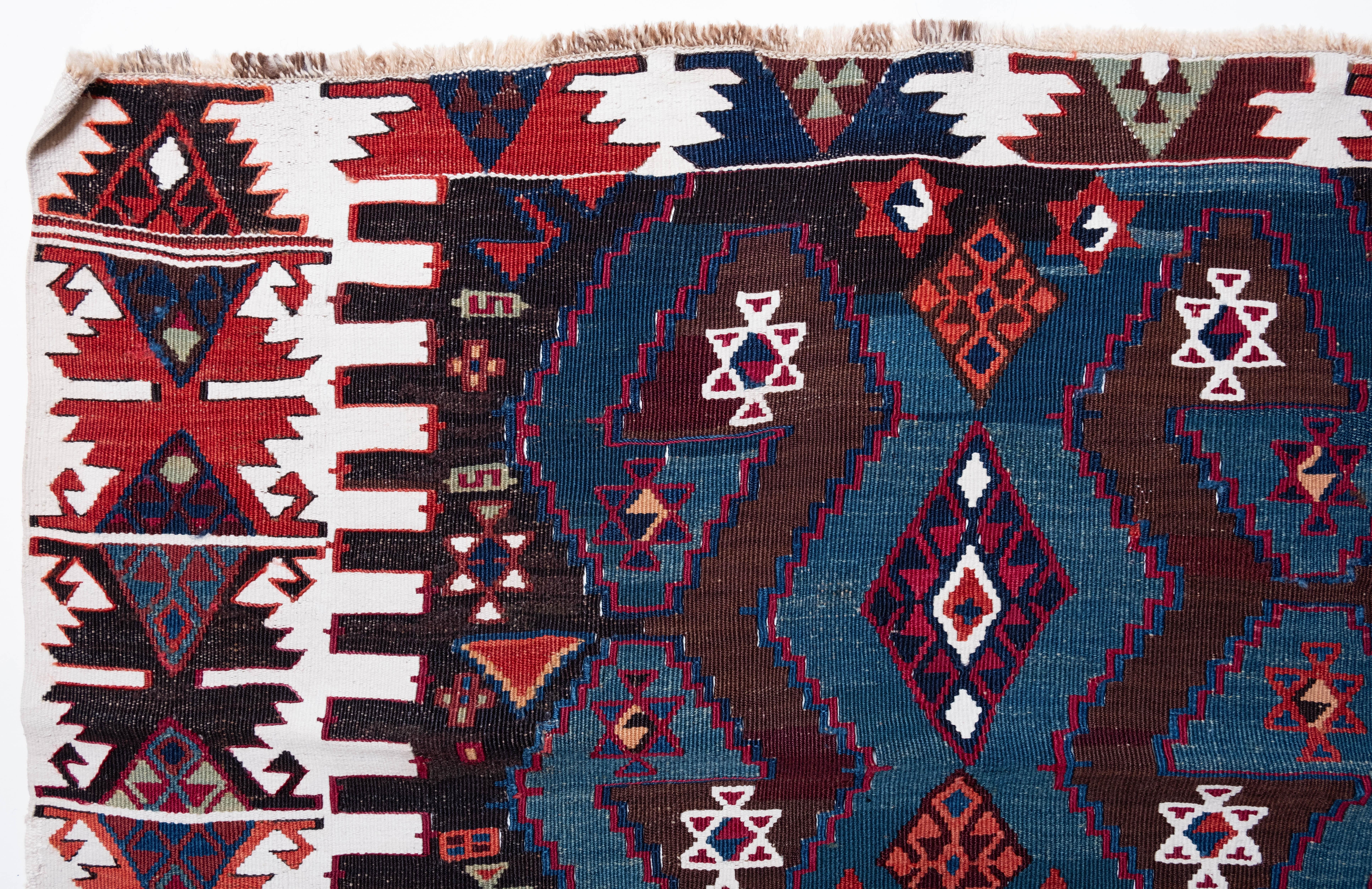 This is Eastern Anatolian Antique Kilim from the Reyhanli region with a rare and beautiful color composition.

This highly collectible antique kilim has wonderful special colors and textures that are typical of an old kilim in good condition. It is