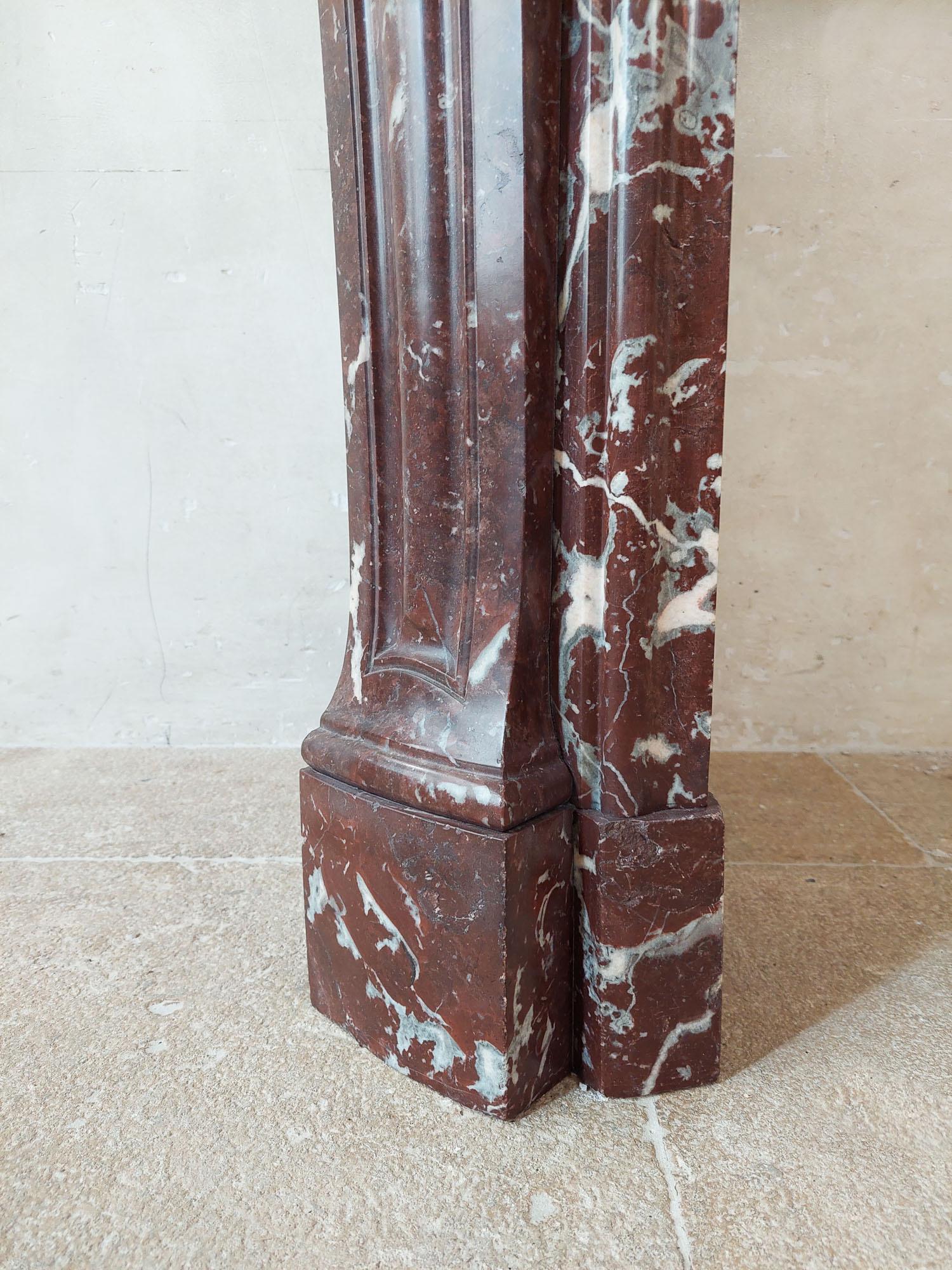 Antique, rich, hand-carved Trois Coquilles mantelpiece in red marble For Sale 5