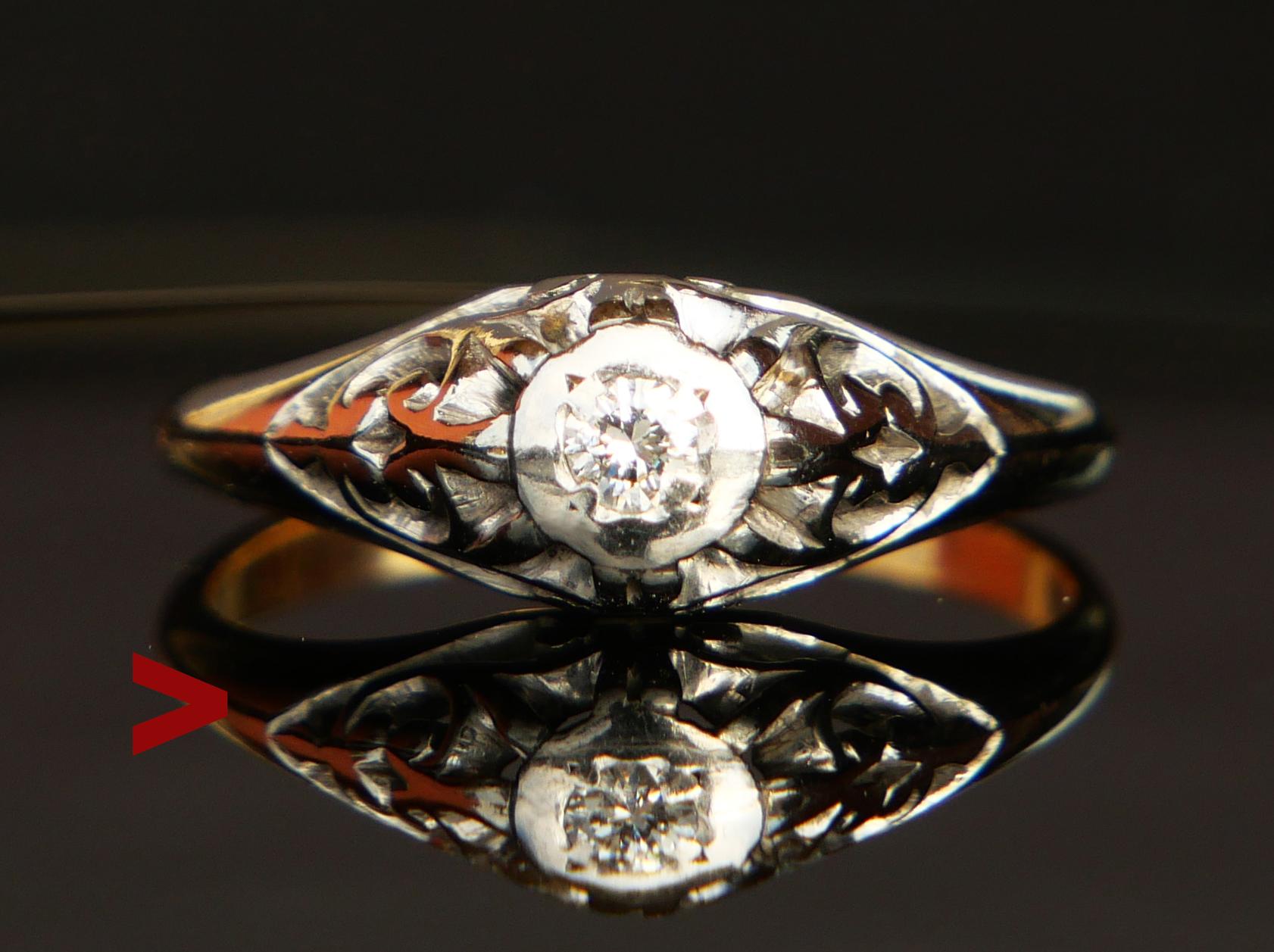 A Diamond ring in solid 18K Gold and Platinum, likely hand - made in USA ca. 1920s - 1930s.

Hallmarked 