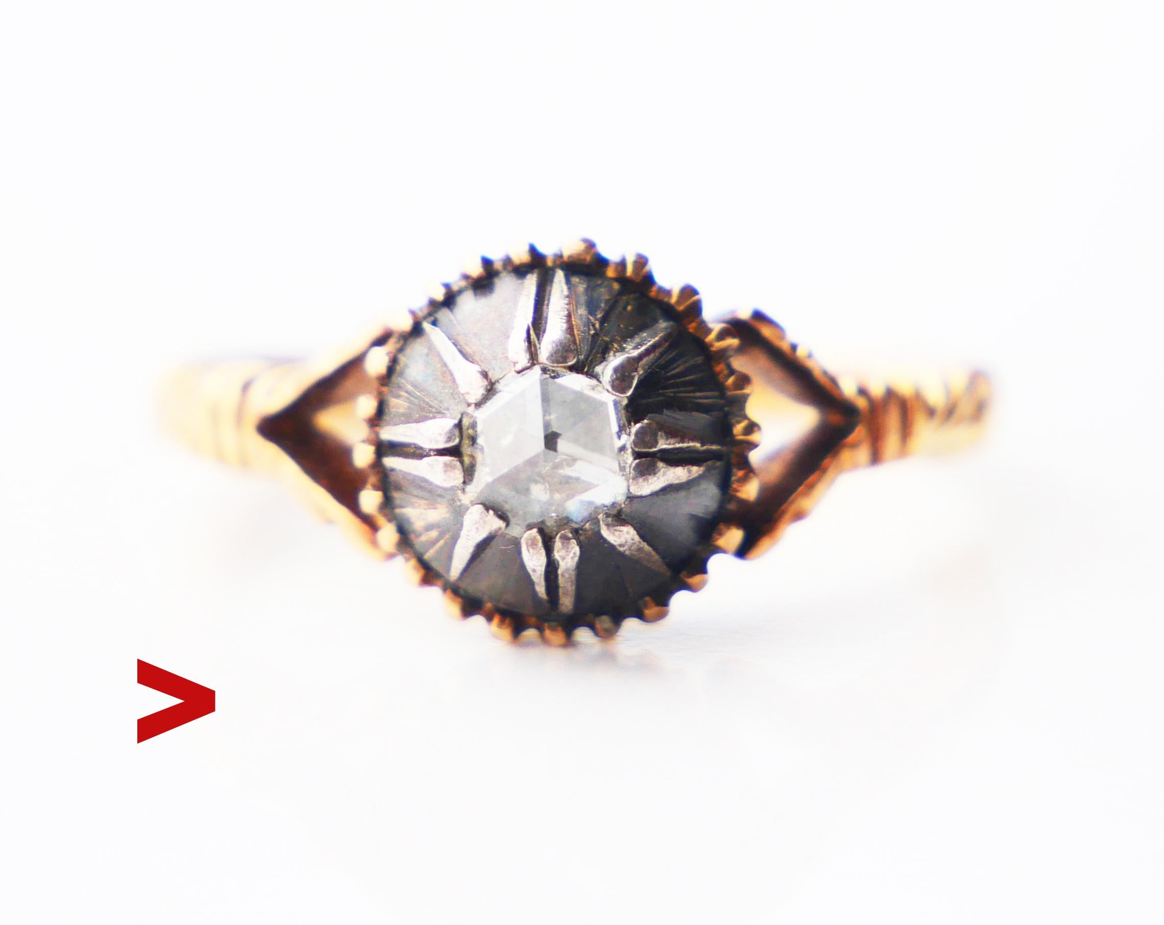 This Renaissance-styled ring is about a combination of Gold, Silver, and Diamond of some type of transitional cut that creates a lot of shiny reflections on its triangular facets. The Diamond is white, measures Ø 4 mm / ca. 0.3 ct with the back side