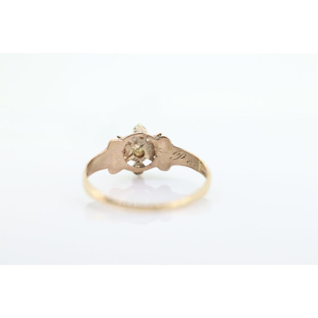 Vintage from the 1930s
Size: 6 US
Materials: Gold
Gemstone: Sapphire
Gem Color: Colorless
Band Color: Gold

Style: Art Deco

Very beautiful Victorian diamond and sapphire ring. Filigree open design shield with four diamonds set in a halo prong