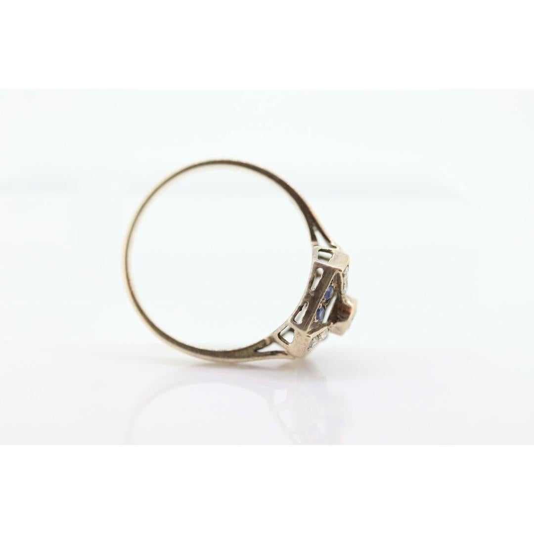 Antique ring. 10k diamond and sapphire shield ring. 10k White Gold Art Deco In Good Condition For Sale In Port Charlotte, FL