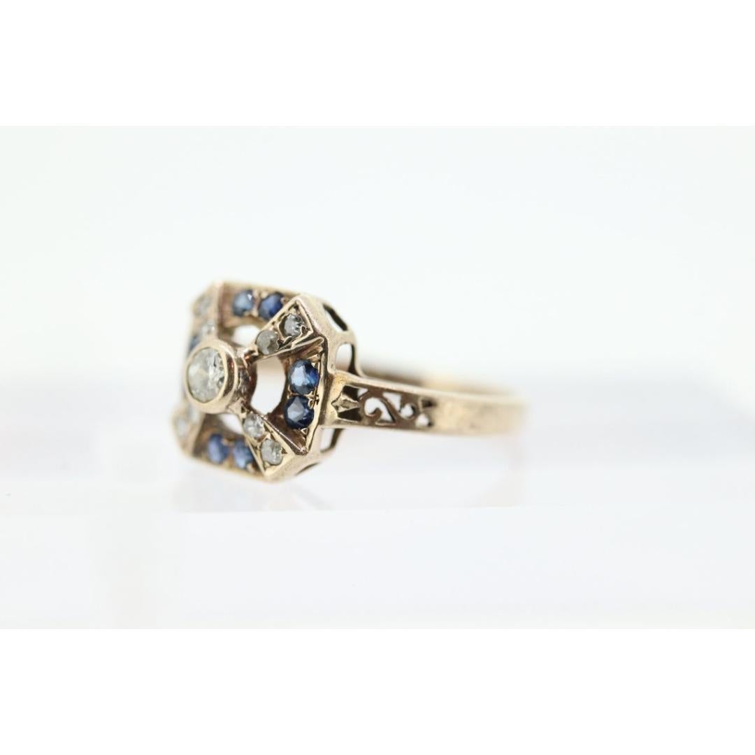 Women's or Men's Antique ring. 10k diamond and sapphire shield ring. 10k White Gold Art Deco For Sale
