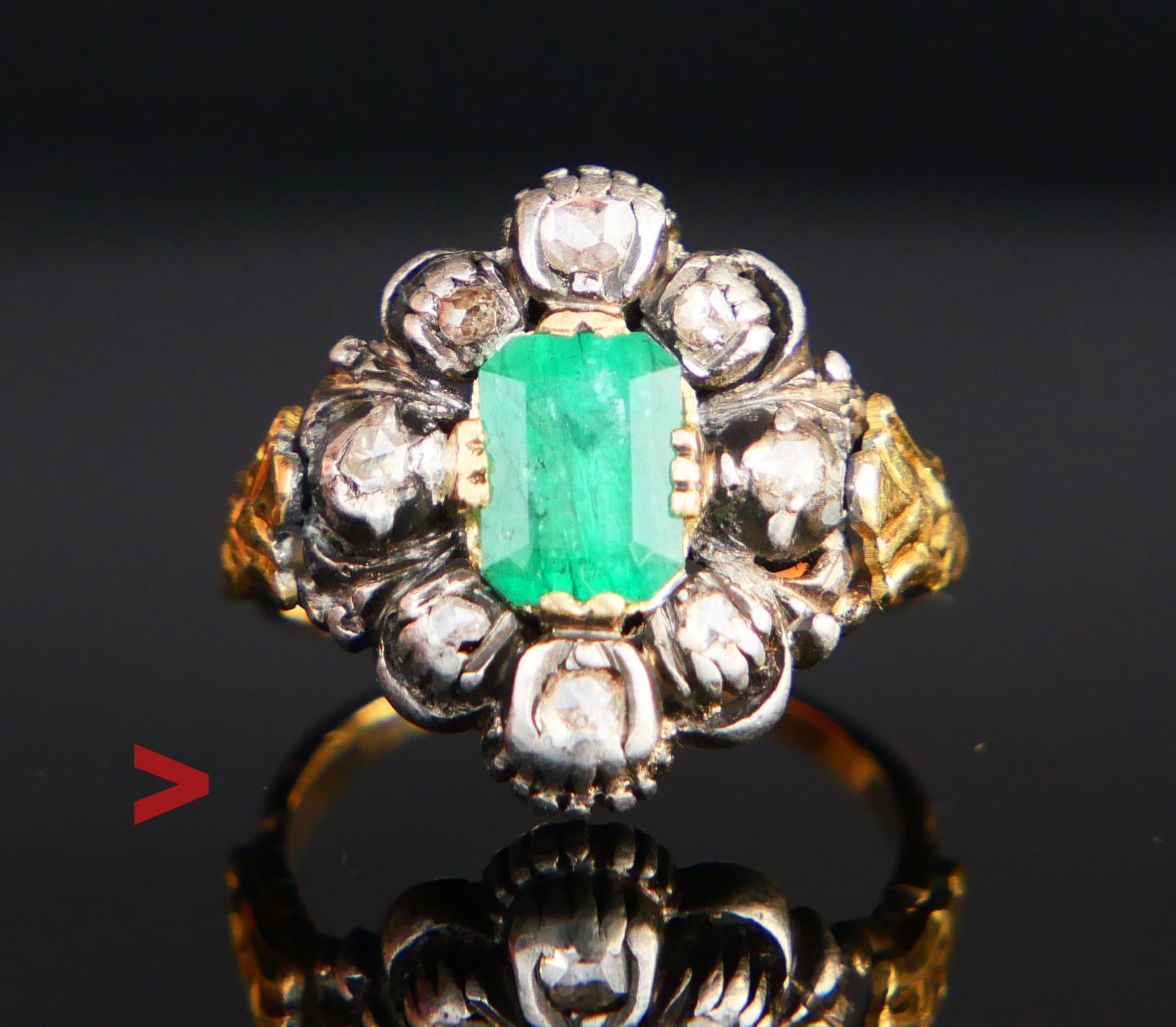 Nice Renaissance-styled cluster Ring with the carved band, shoulders, and parts of the crown in solid 18ct greenish Yellow Gold holding natural Emerald stone and four rose - cut Diamonds set in Silver clusters.

Crown 16 mm x 13 mm x 5 mm